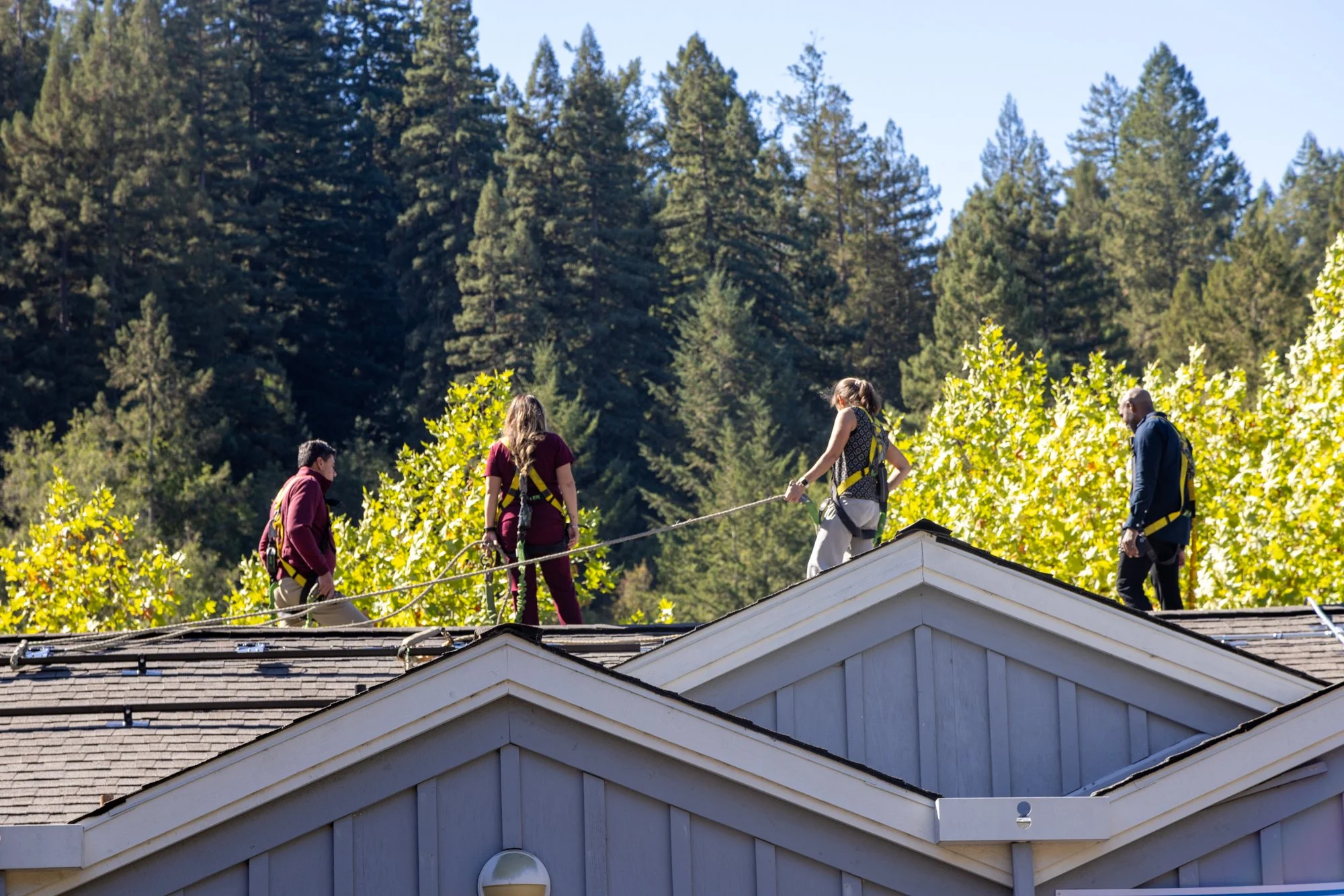 people standing on a roof