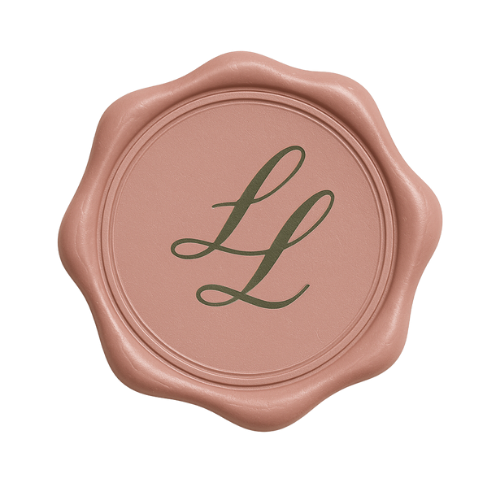 A pink wax stamp with the letter 'L' in cursive within a round border.