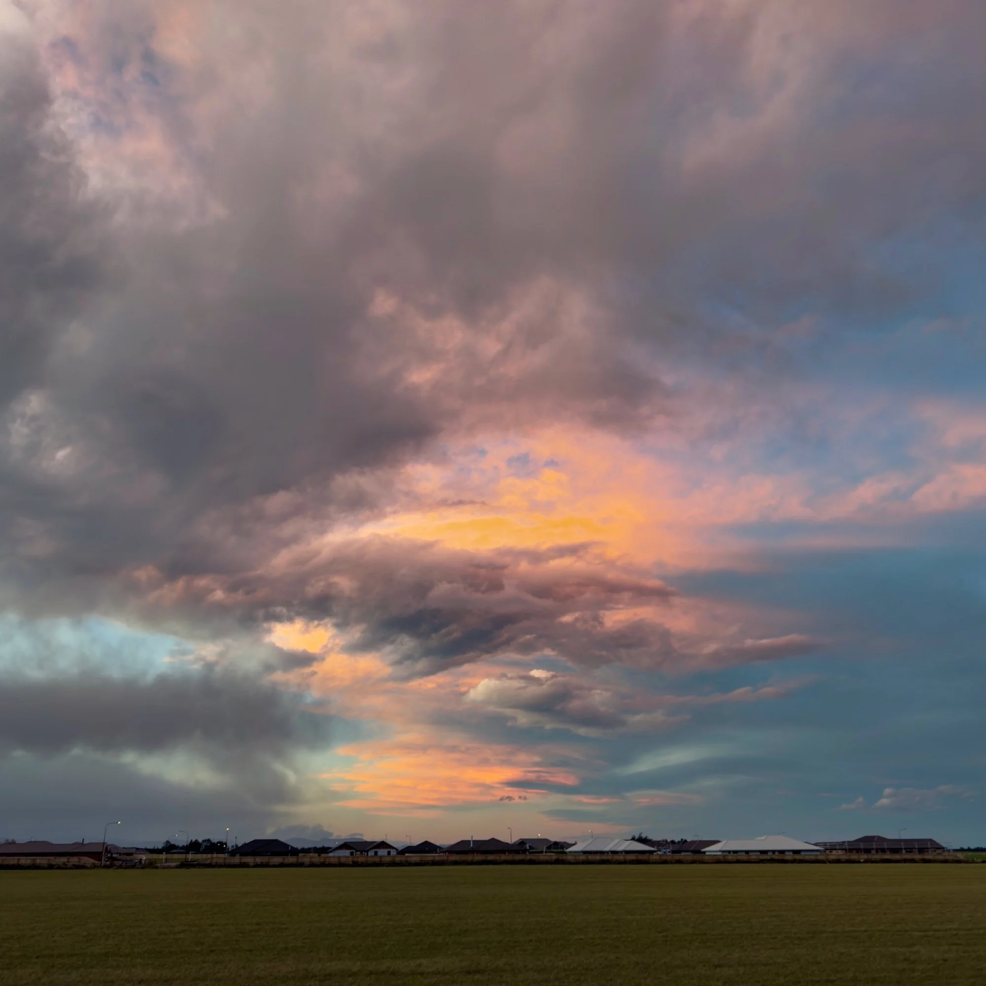 Another Amazing Cloud
This photograph was taken from my backyard in Darfield. I spotted this spectacular cloud while driving home from a quick trip to the shops. Knowing the colours would fade quickly, I hurried home and rushed to the back fence with