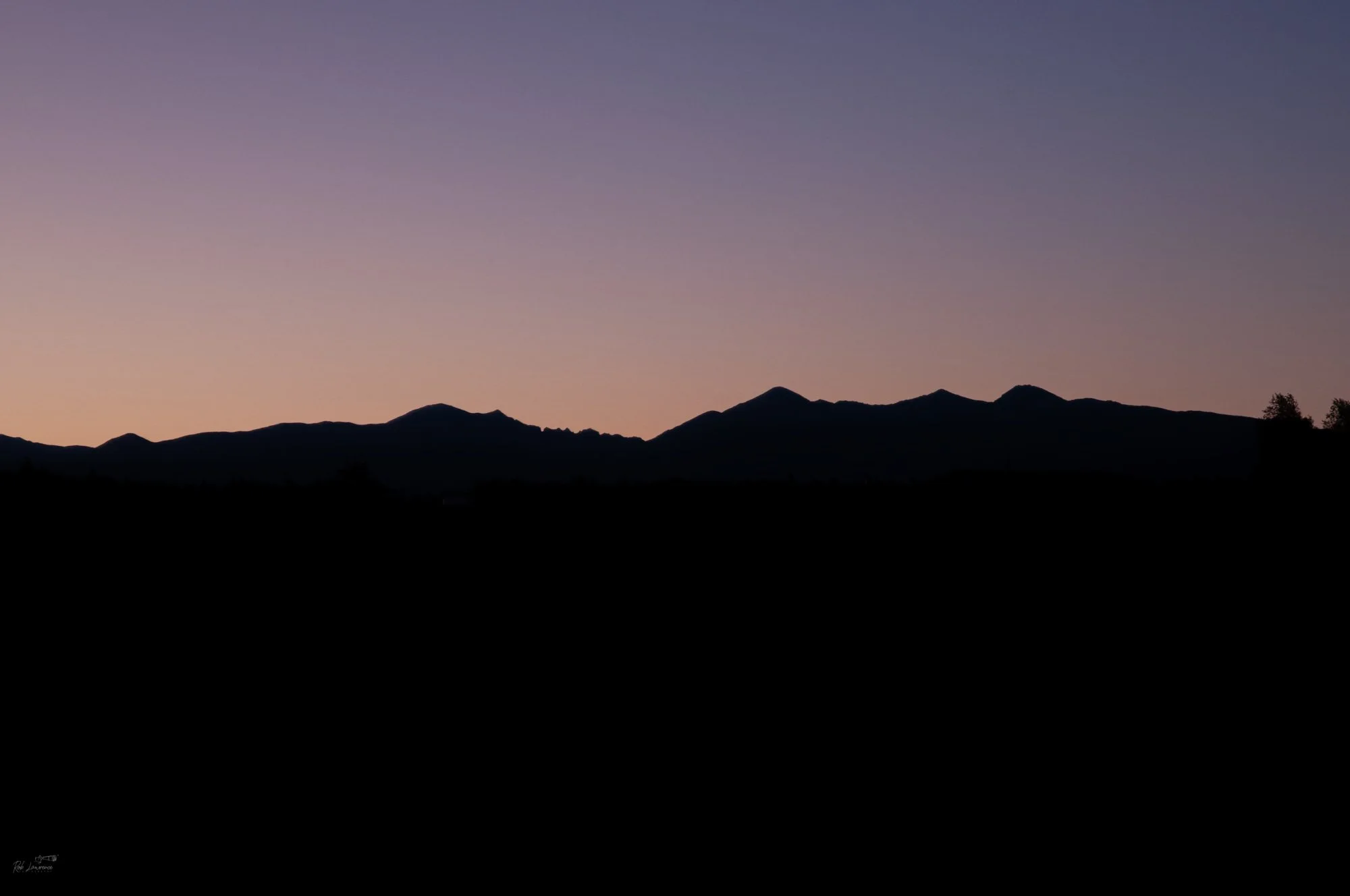 The silhouette of Sleeping Beauty  (Torlesse Range )    The gap is her chin. Foggy peak is her forehead.  the rest is up to you 