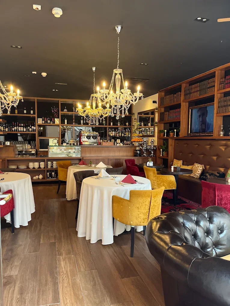 Marmont Hotel with bar and tables with clothes.webp