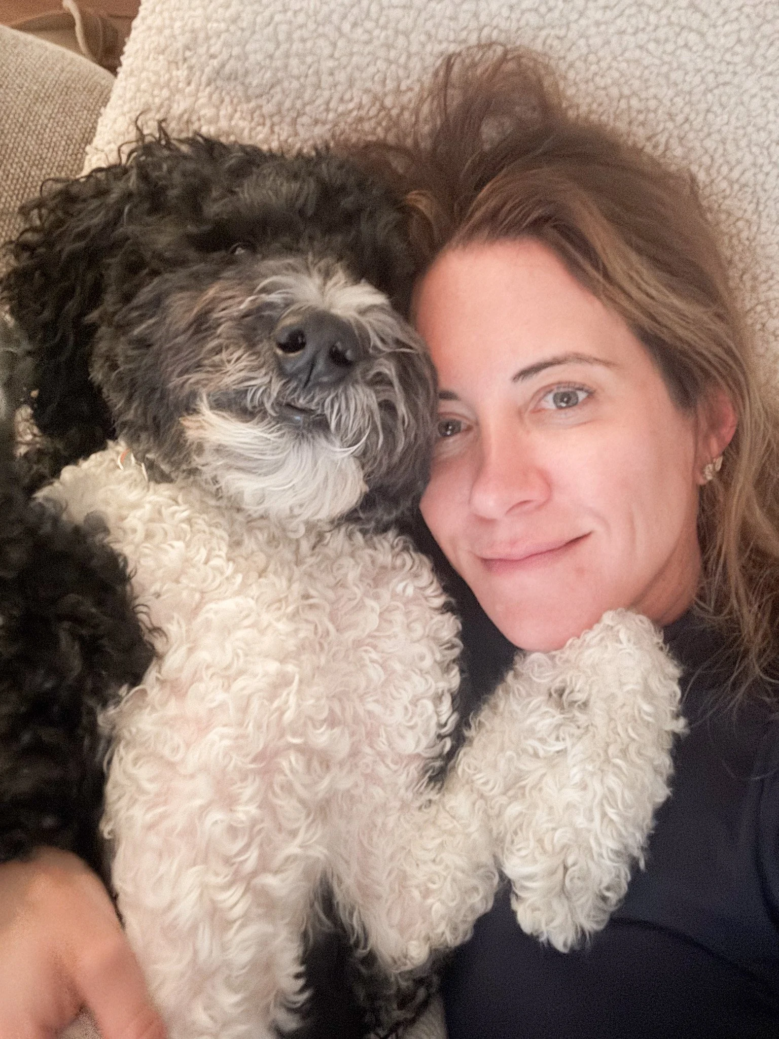 Erin Freeman founder of Curated, Adjacent with her bernedoodle, Baxter who was named after her old street in Nantucket.