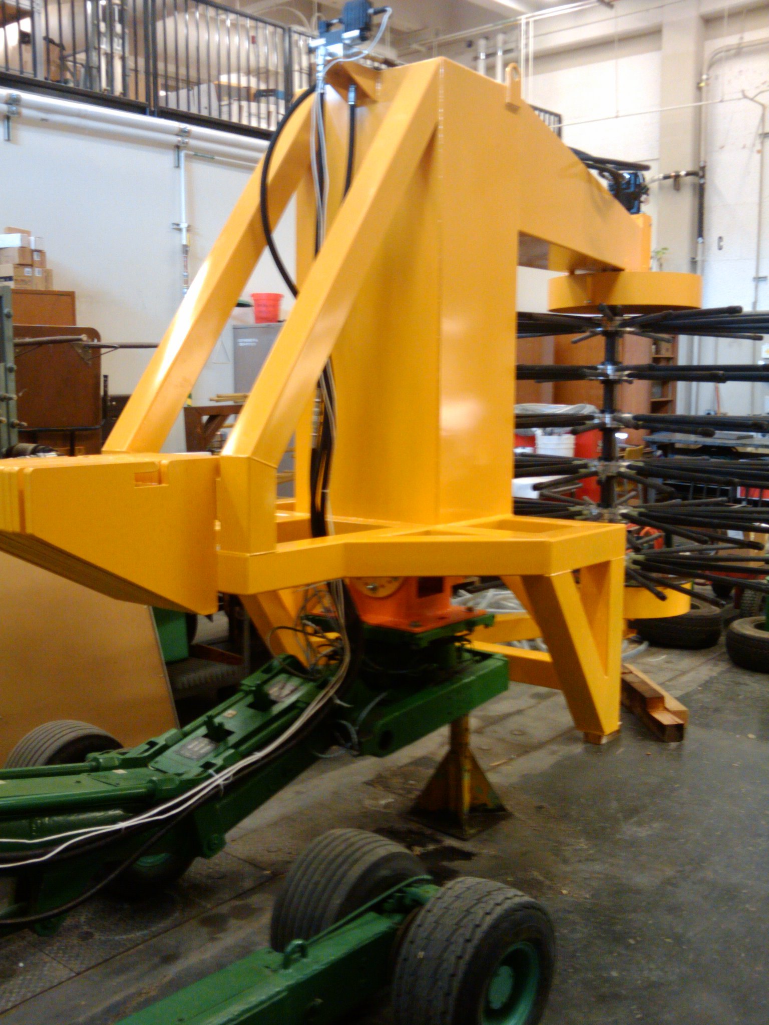 Rear counter weights so it balances on the manipulator arm.