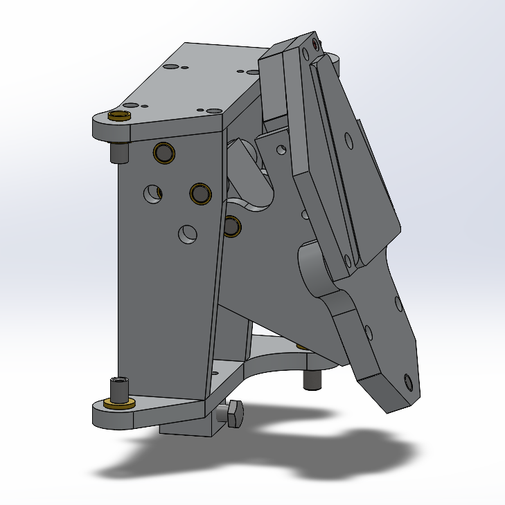A four bar linkage acts as a hinge to allow the arm to move out of the way if the vehicle pitches sideways and drives the arm into the ground.