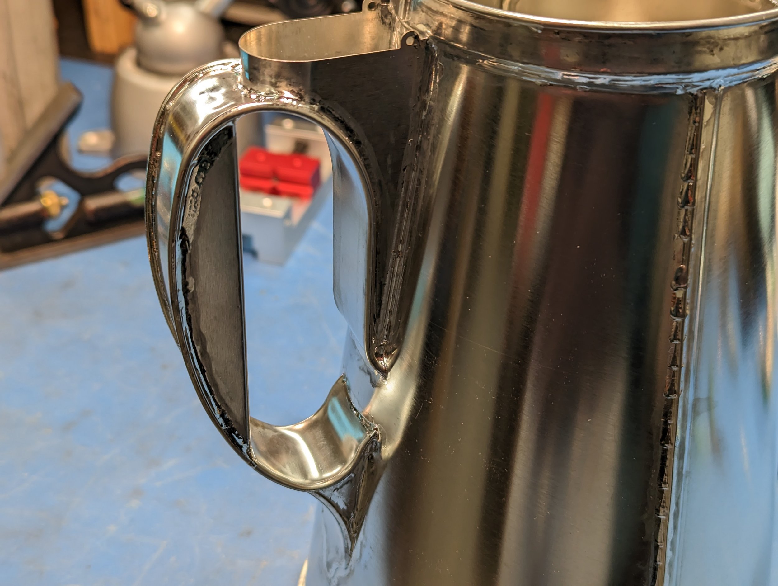 Handle and boiler fill spout.