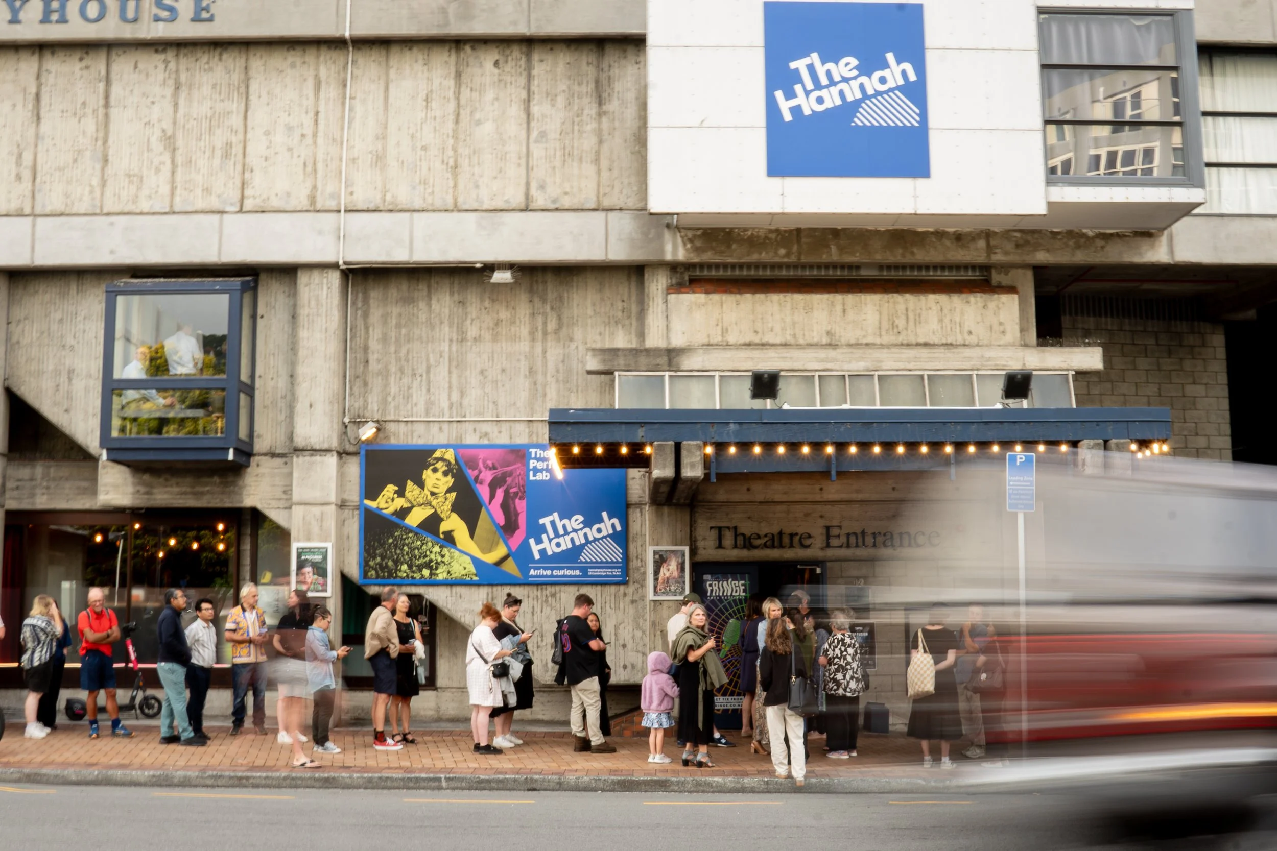 A busy night at The Hannah during NZ Fringe. People lining up outside the theatre and visible through the window hanging out in the first floor bar. Photo by Afrina Razi.