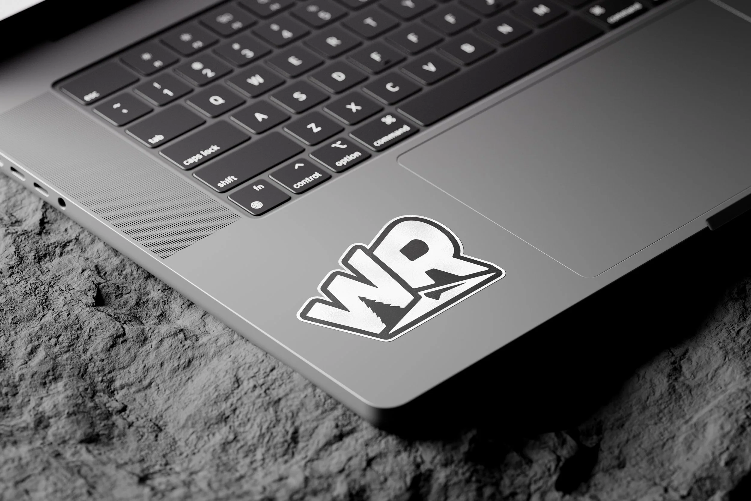 WR Black Logo Sticker on Laptop.jpg