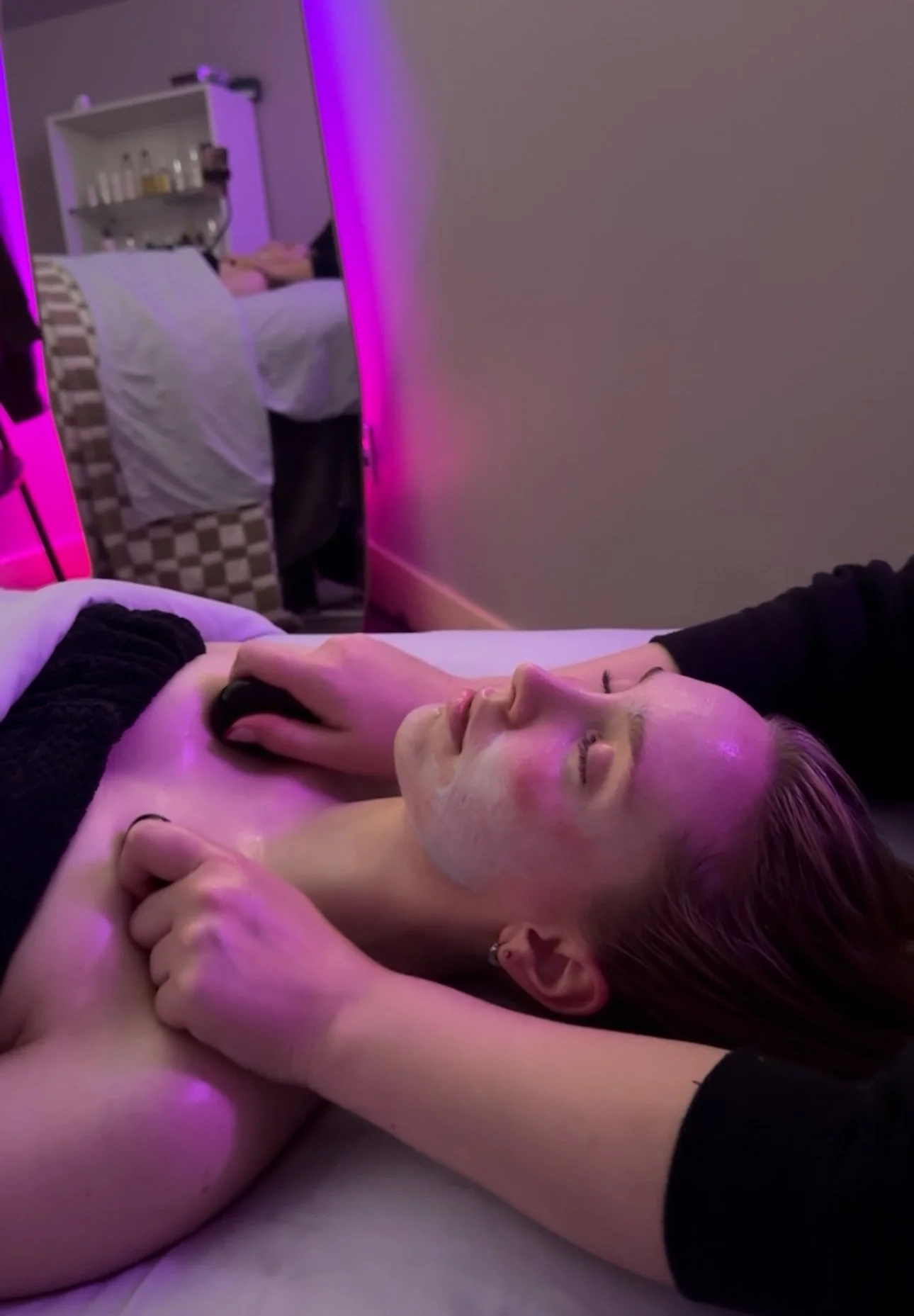 Custom Facial Salem Oregon client relaxing getting hot stone massage