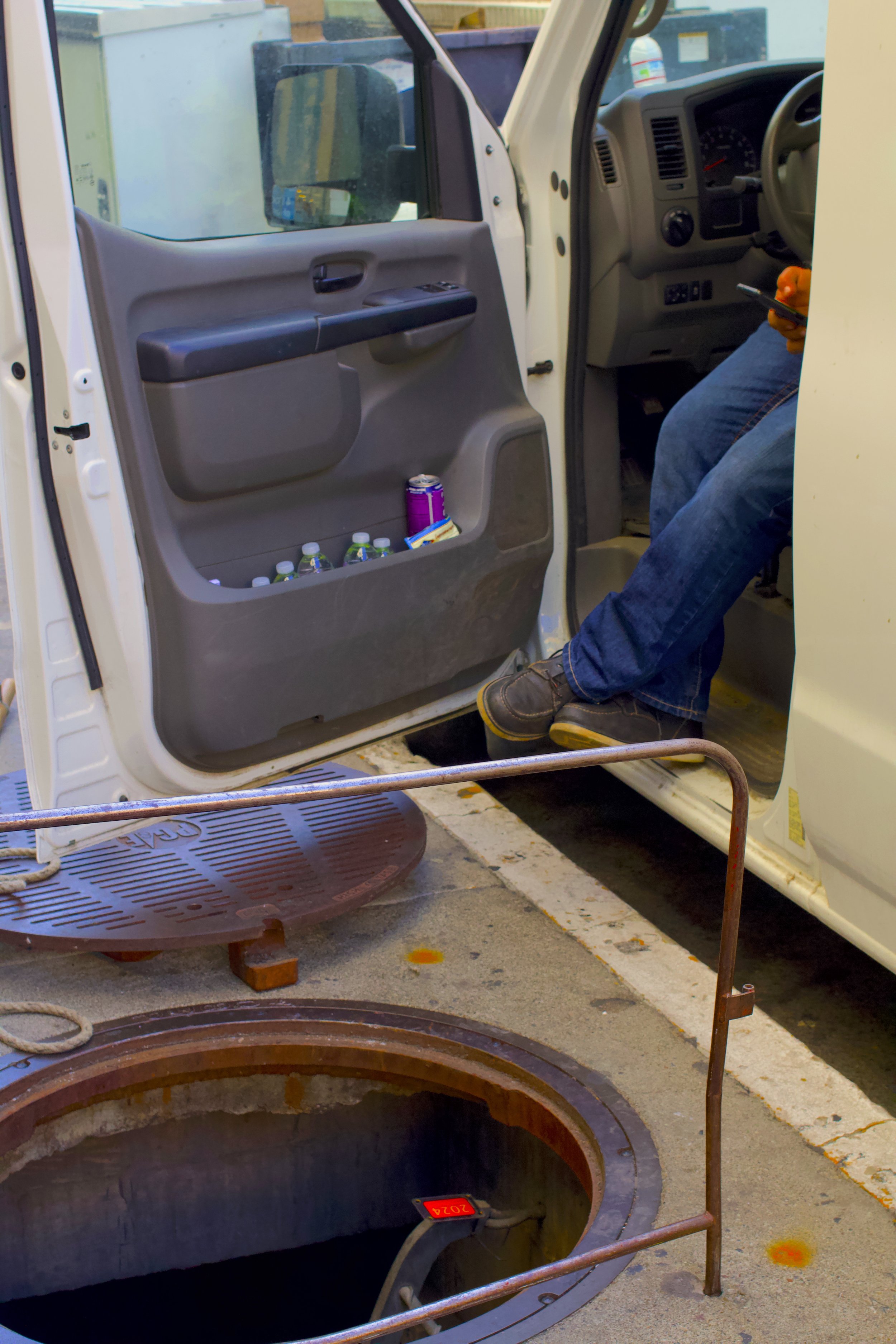 Open manhole with van.jpeg