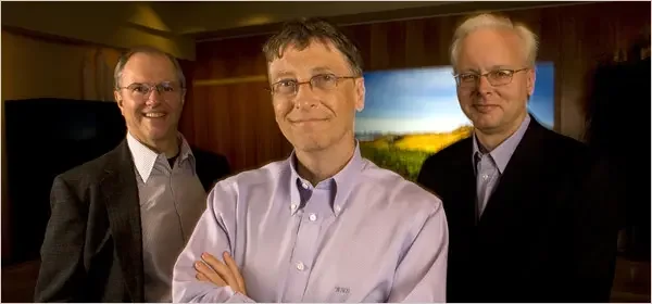 
Microsoft’s founder, Bill Gates, flanked by his designated successors: Craig Mundie, left, head of research and strategy, and Ray Ozzie, top software architect. - New York Times, 2007