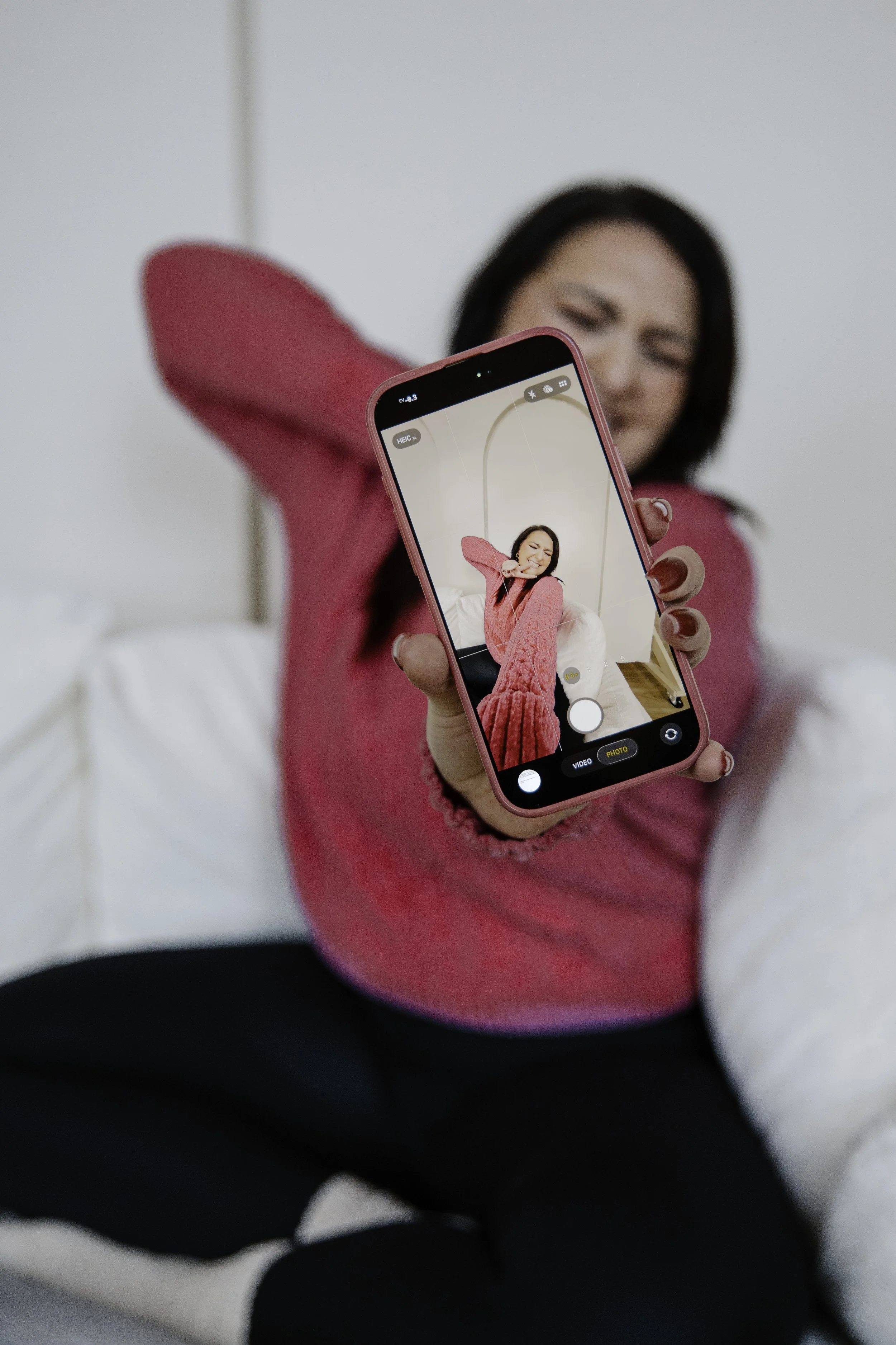 Kellie Wilson working on social media content for wellness professional client"