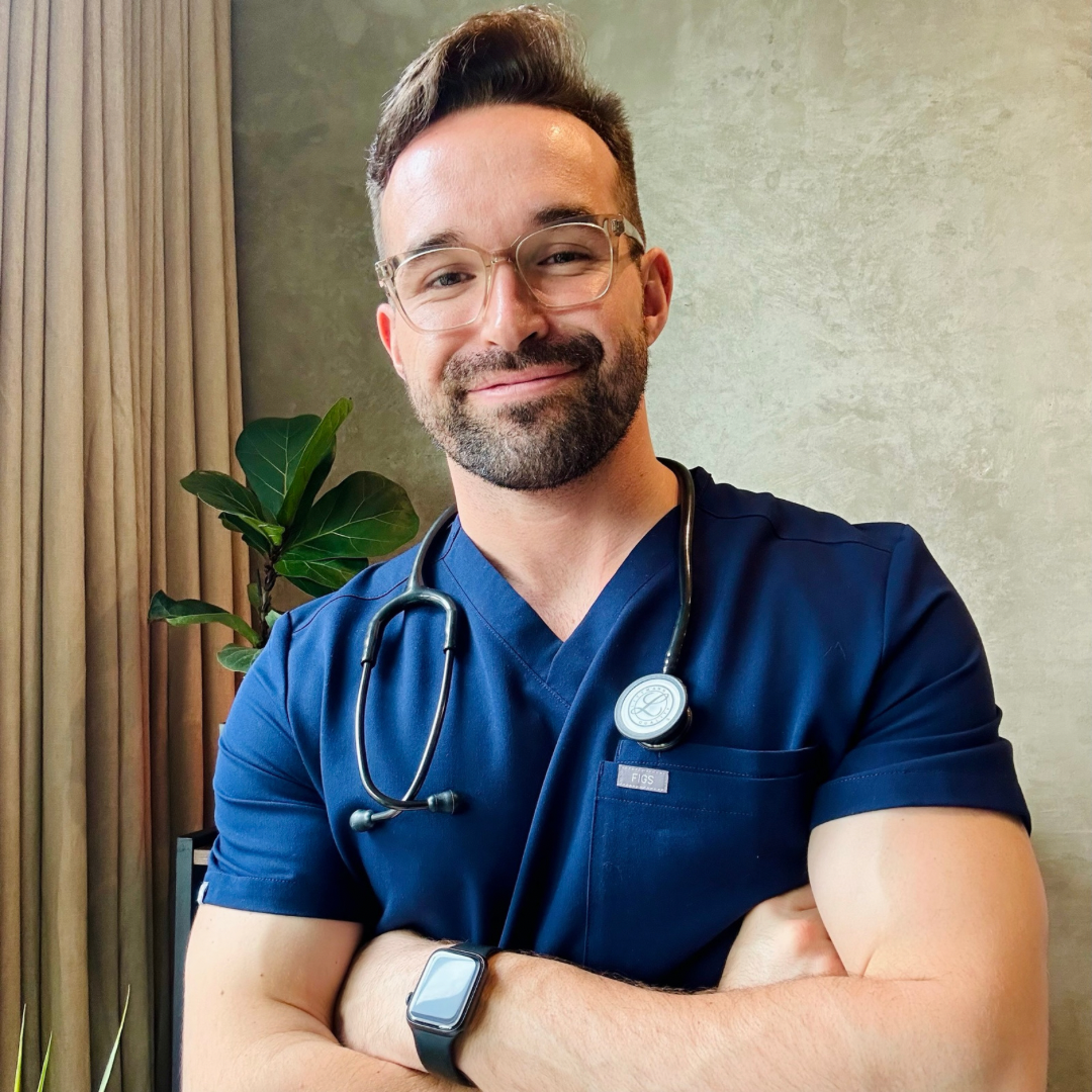 A headshot of Dr.Connor Anderson, ND. Taken while he is working on location at his Naturopathic clinic in Toronto.