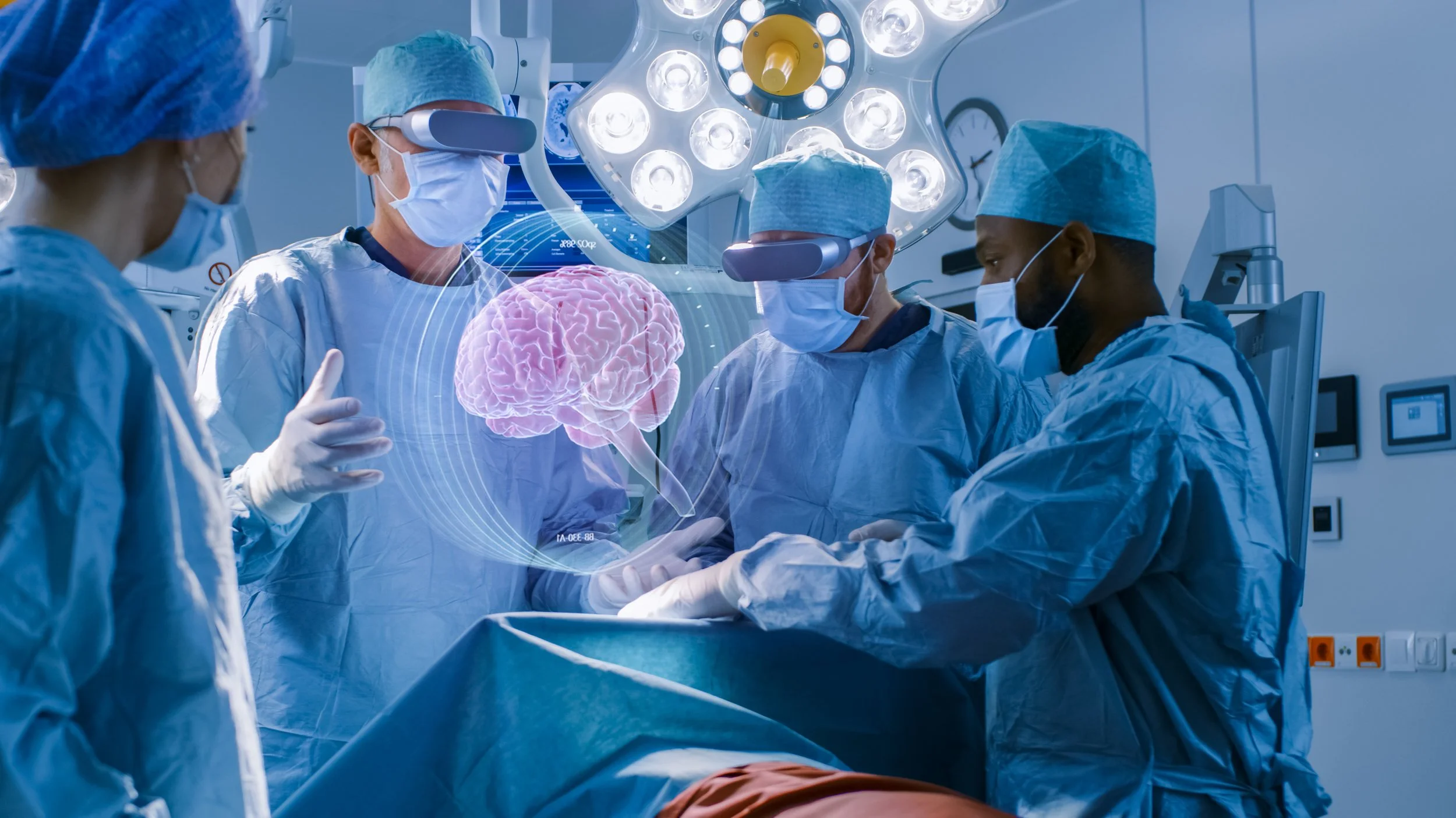 A team of surgeons and medical staff in an operating room, using augmented reality technology to view a digital brain during brain surgery.