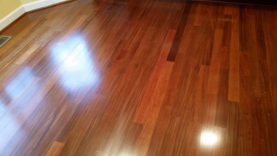 Polished hardwood floor with natural wood grain patterns