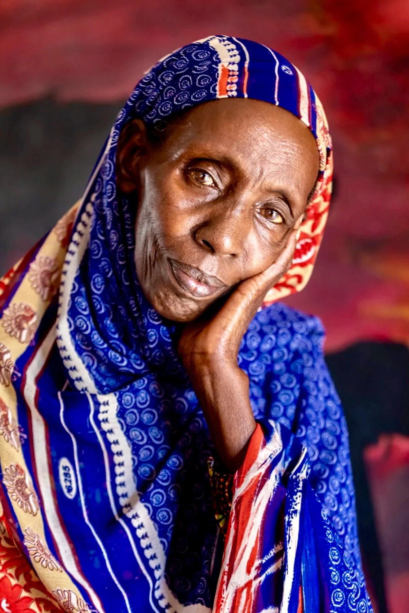 Mama Teta, a beloved craft teacher I meet while teaching in Kigali, Rwanda, brings gentleness and creativity to the children she works with. After years away, I returned to find her still guiding young hands with patience, dignity, and quiet strength