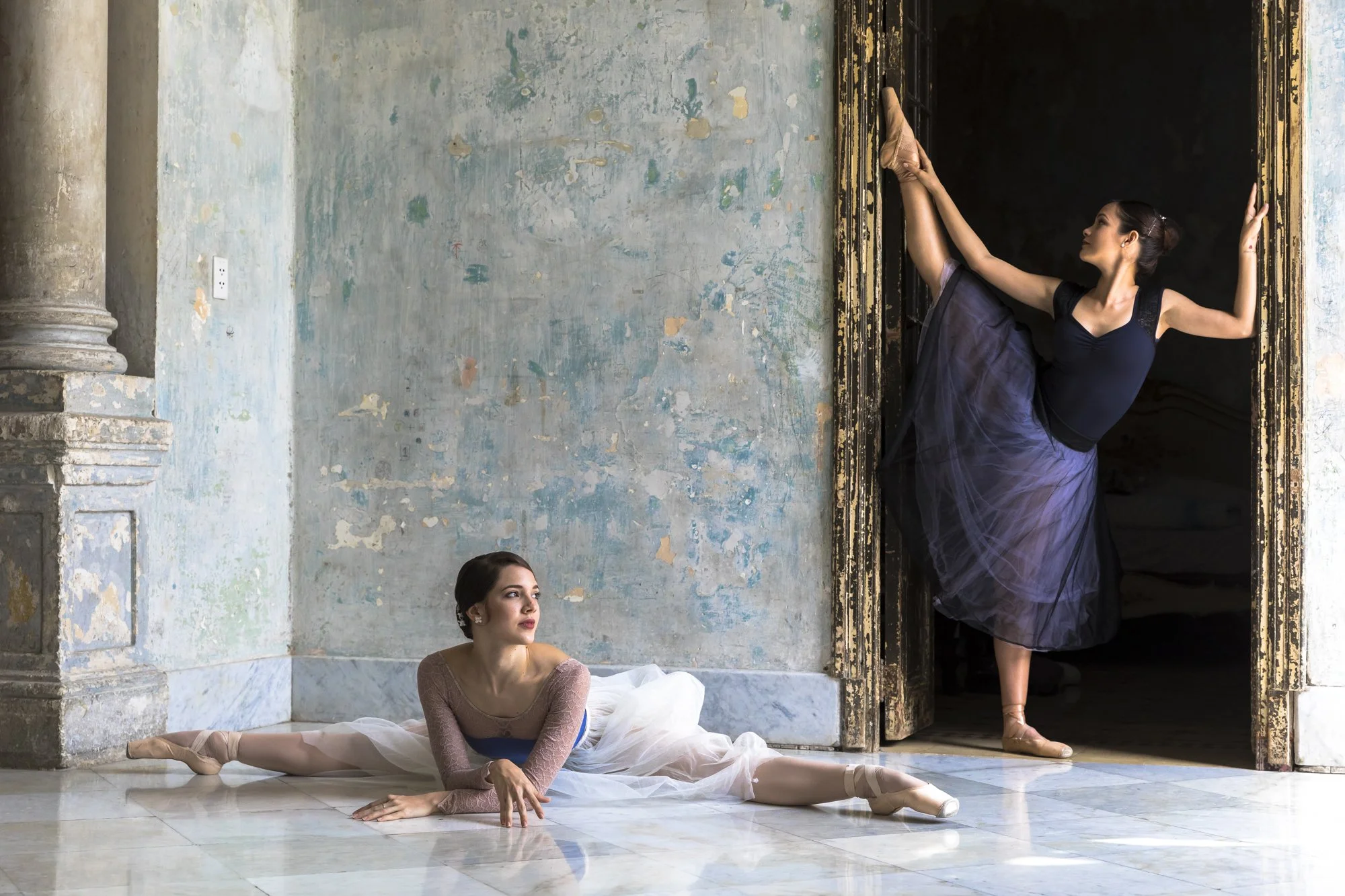 Ballet dancers rehearse inside a crumbling historic building in Havana, Cuba—where the grace of classical ballet endures despite the city’s aging infrastructure and economic challenges.