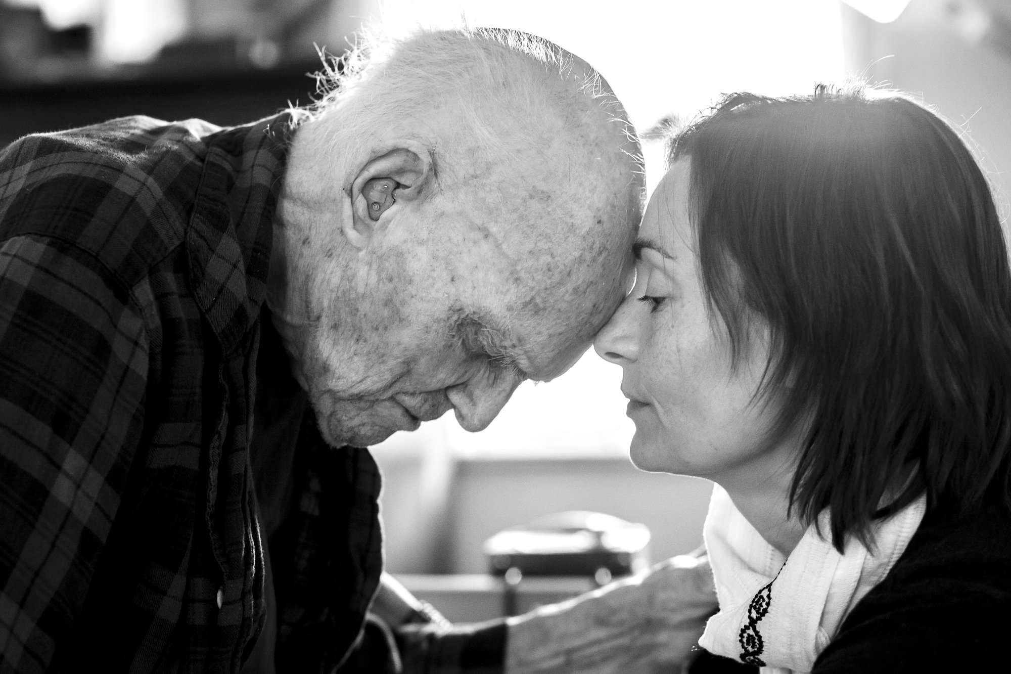 I photographed Reverend Gerald Gilmore, 100, with his granddaughter, Nina, at his home in Orleans. Nina had come to Cape Cod to spend the last few months with him, and I was deeply moved by the tenderness between them. She told me her grandfather — w