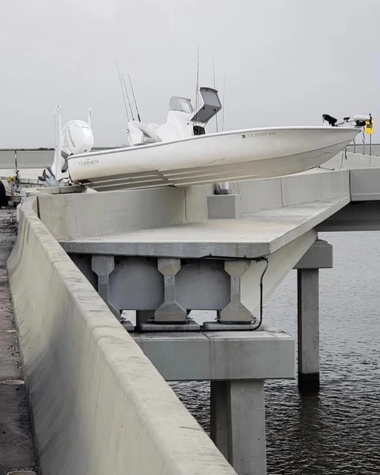 Throwback to this accident. Our hulls are built so well the bridge had more damage than the boat! #resininfusion #mercurymarine #turnerboatworks