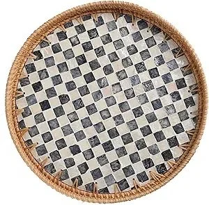Round rattan tray with black-and-white checkerboard inlay and woven edge detail