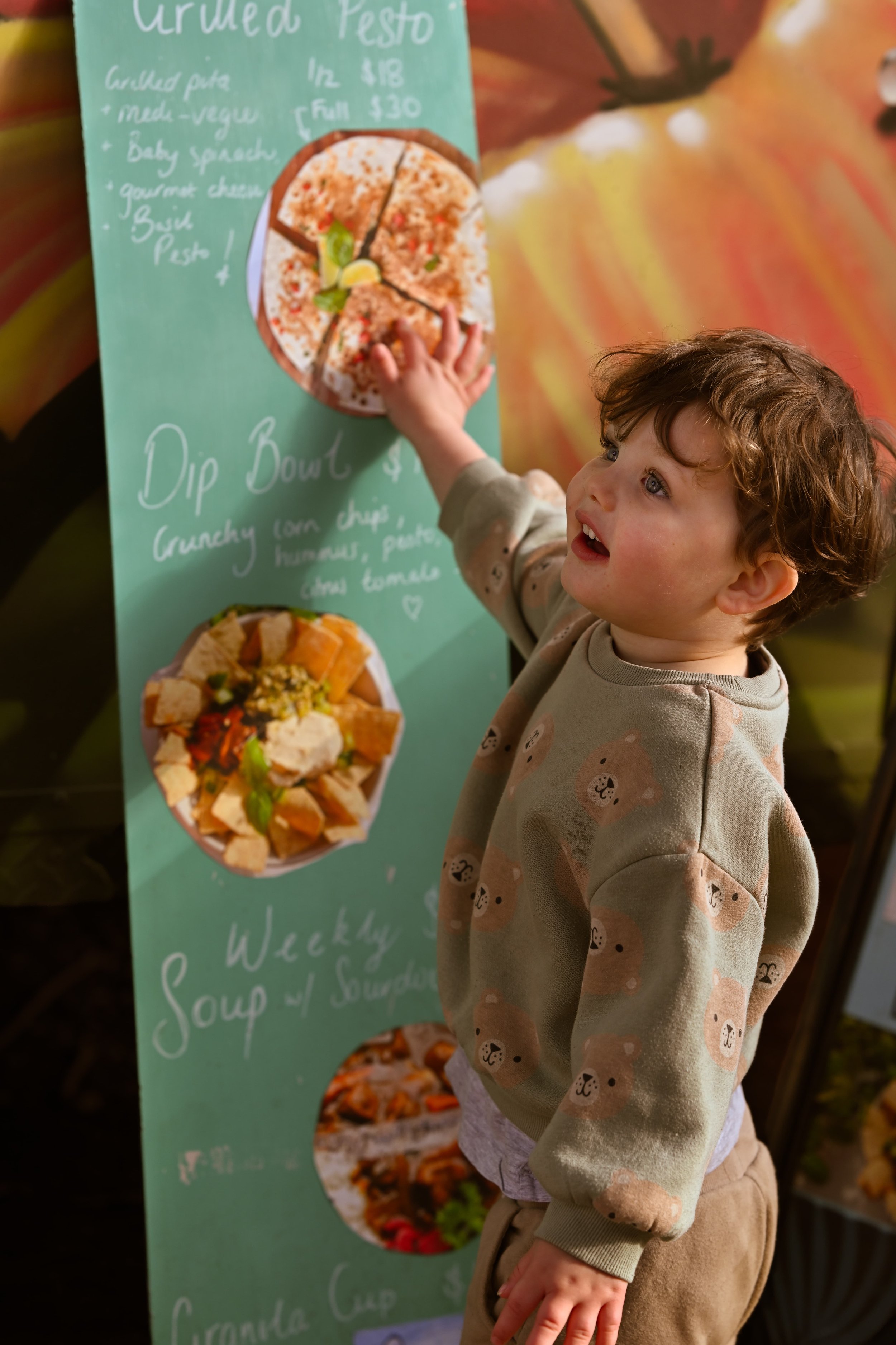 young_boy_excited_at_nurturebar_menu_Portstephens.jpg