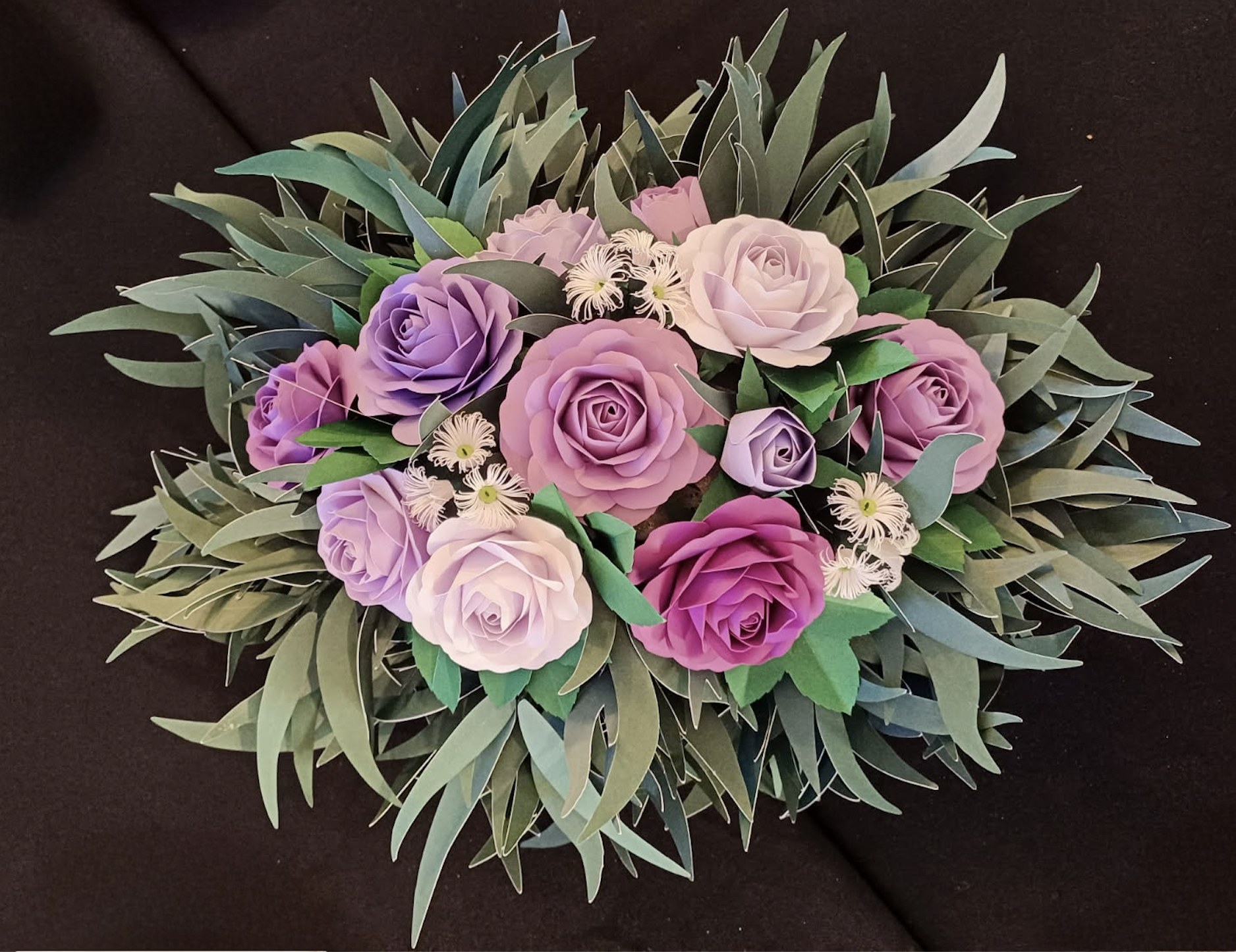 Paper Flower centrepiece, featuring roses and eucalyptus