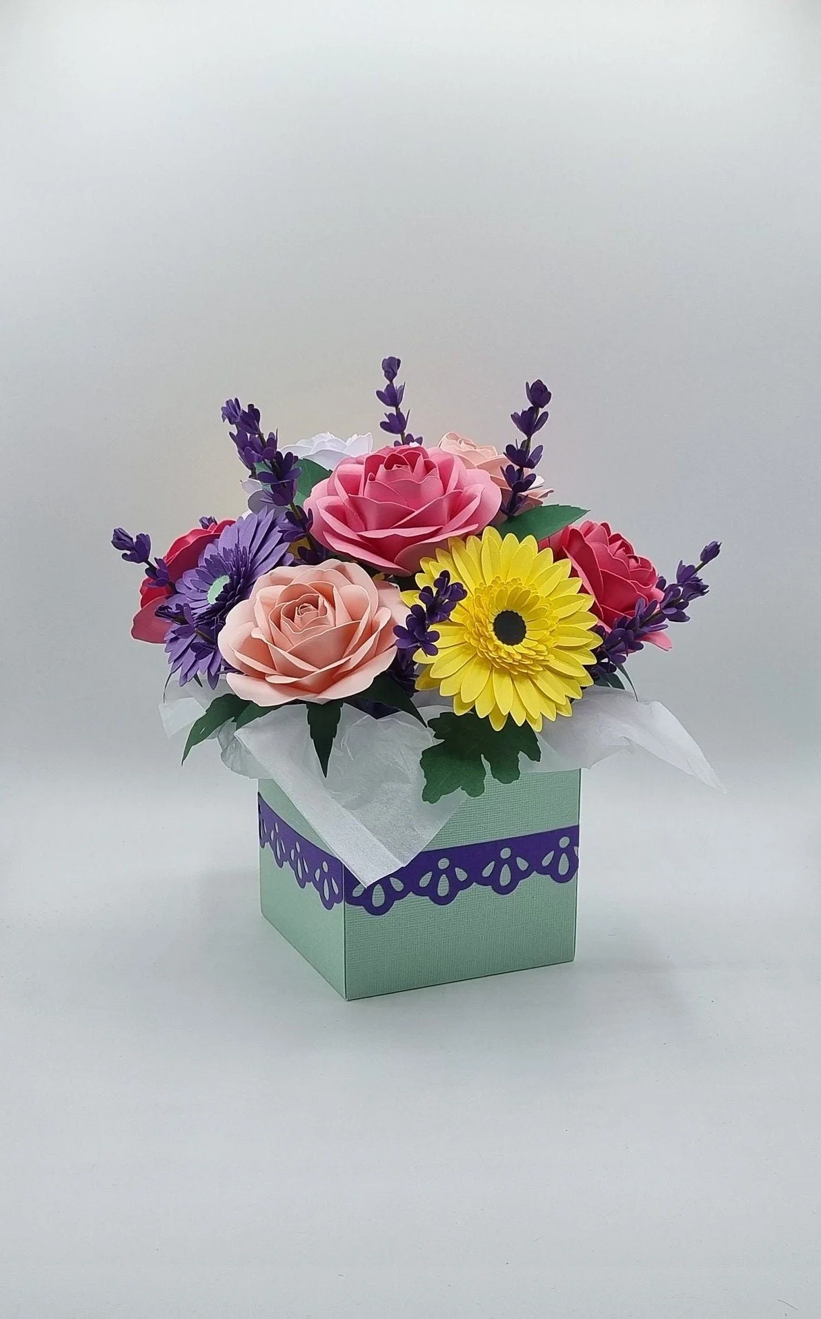 Handmade paper flower bouquet in a mint green gift box with purple ribbon, featuring pink roses, purple gerbera daisy and lavender sprigs - crafted in Perth, WA by Uniquely Packaged