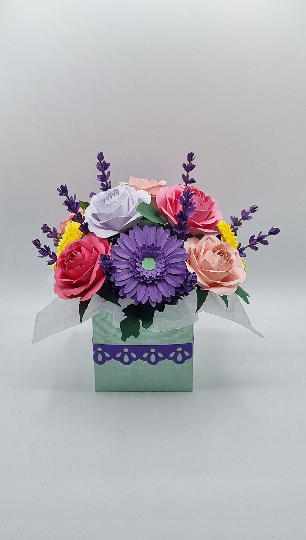 Handmade paper flower bouquet in a mint green gift box with purple ribbon, featuring pink roses, purple gerbera daisy and lavender sprigs - crafted in Perth, WA by Uniquely Packaged
