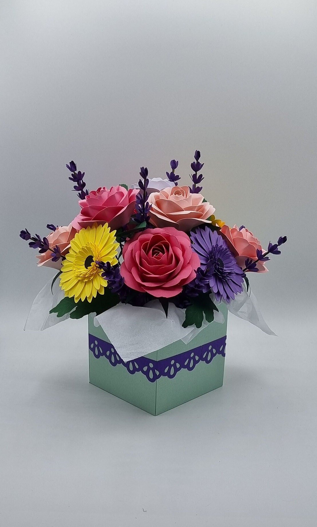 Handmade paper flower bouquet in a mint green gift box with purple ribbon, featuring pink roses, purple gerbera daisy and lavender sprigs - crafted in Perth, WA by Uniquely Packaged