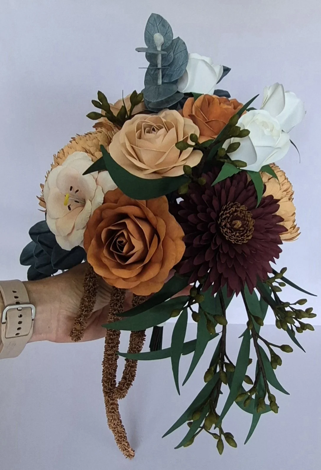 A custom handmade paper replica wedding bouquet created as a lasting keepsake inspired by the bride’s original wedding flowers.