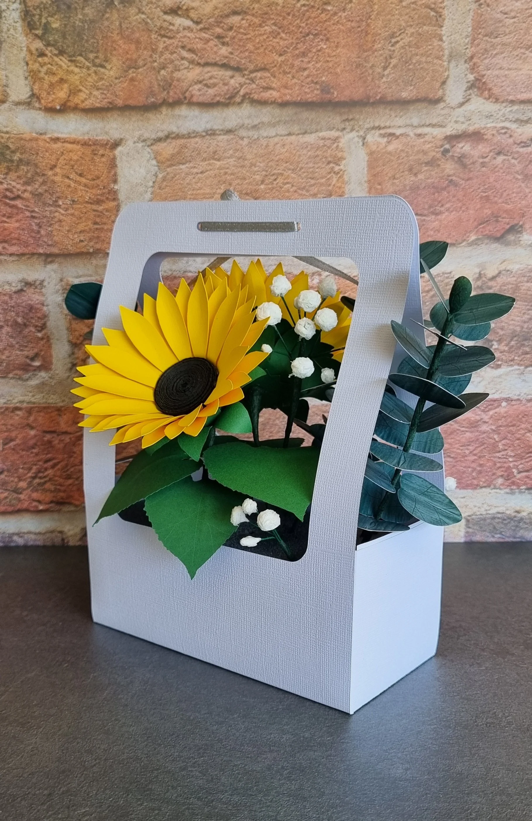 Back view of the paper flower arrangement showing the layout of the sunflower, greenery, and the bloom-themed thank-you message.jpg
