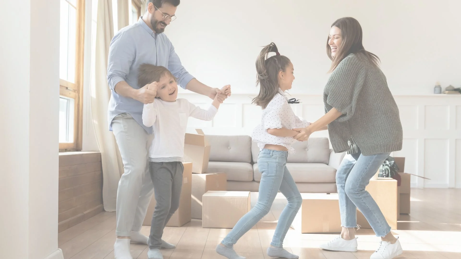 A family of four moving into their new home