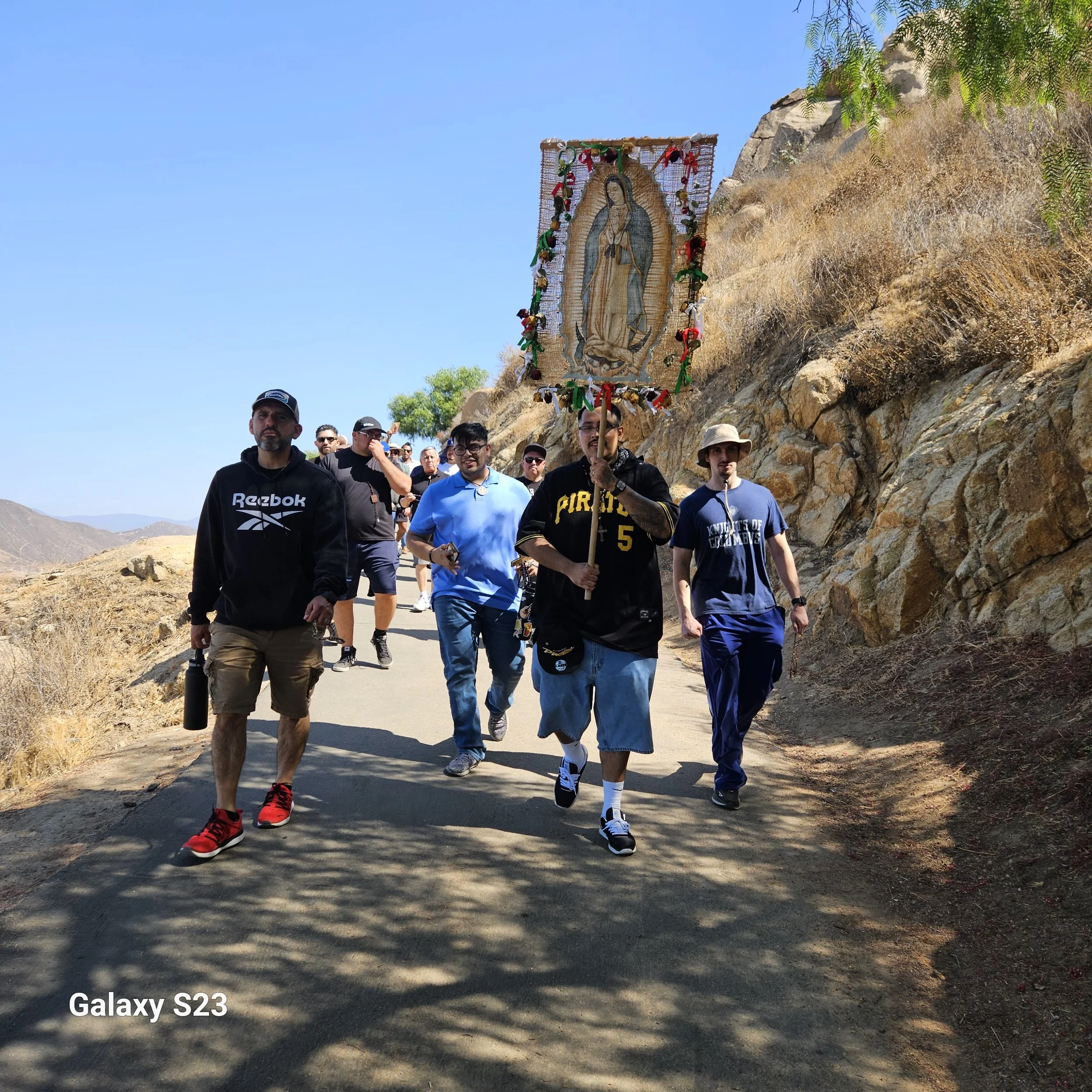 TUC7 Catholic men walking together during a Rosary March