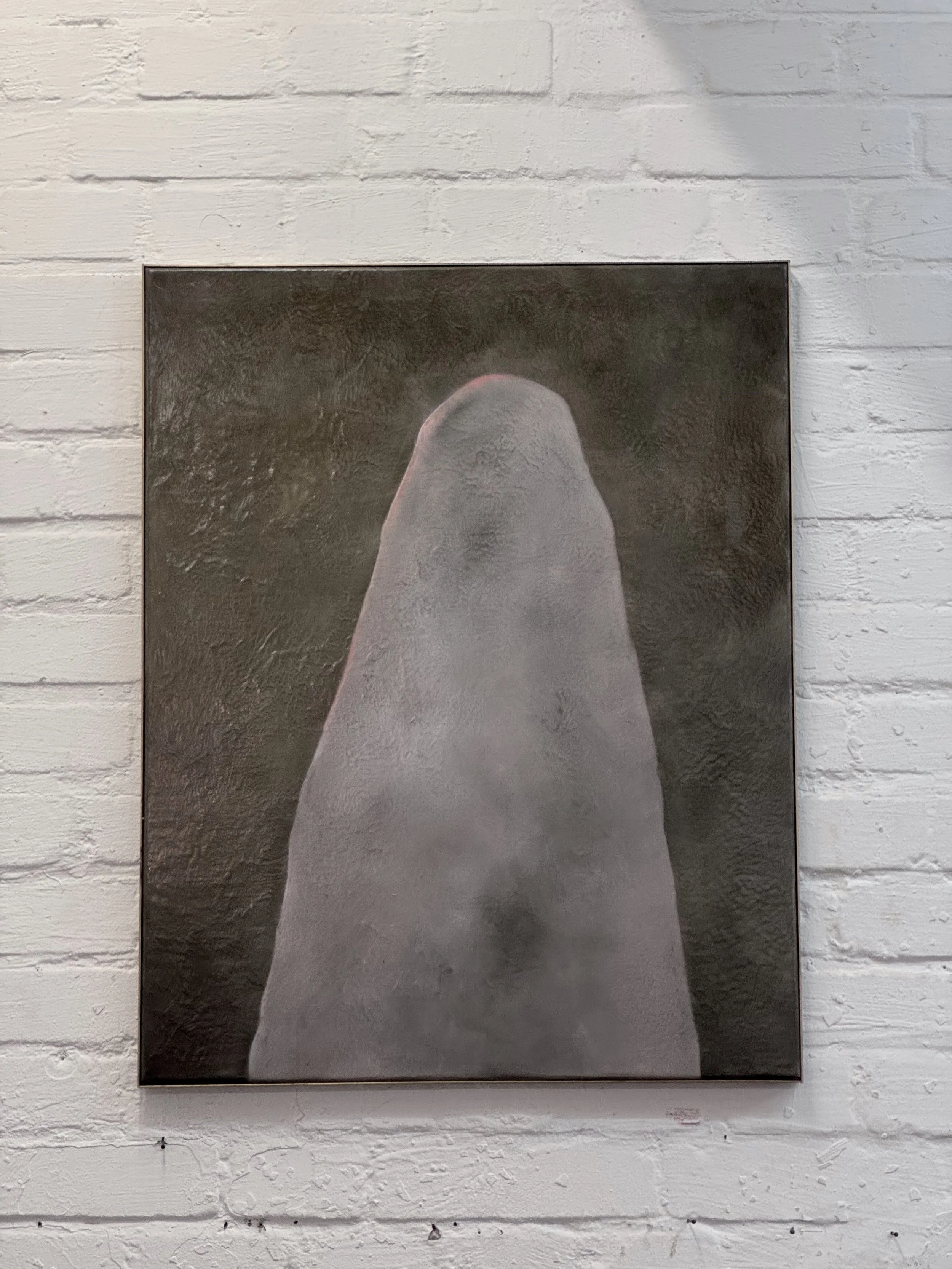 Black and white art piece of a close-up  on a textured wall.