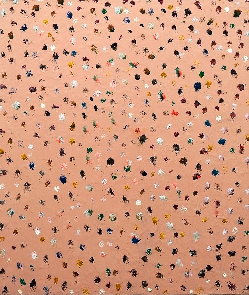 Abstract painting with numerous small, colorful paint splatters and dots on a light pink background.