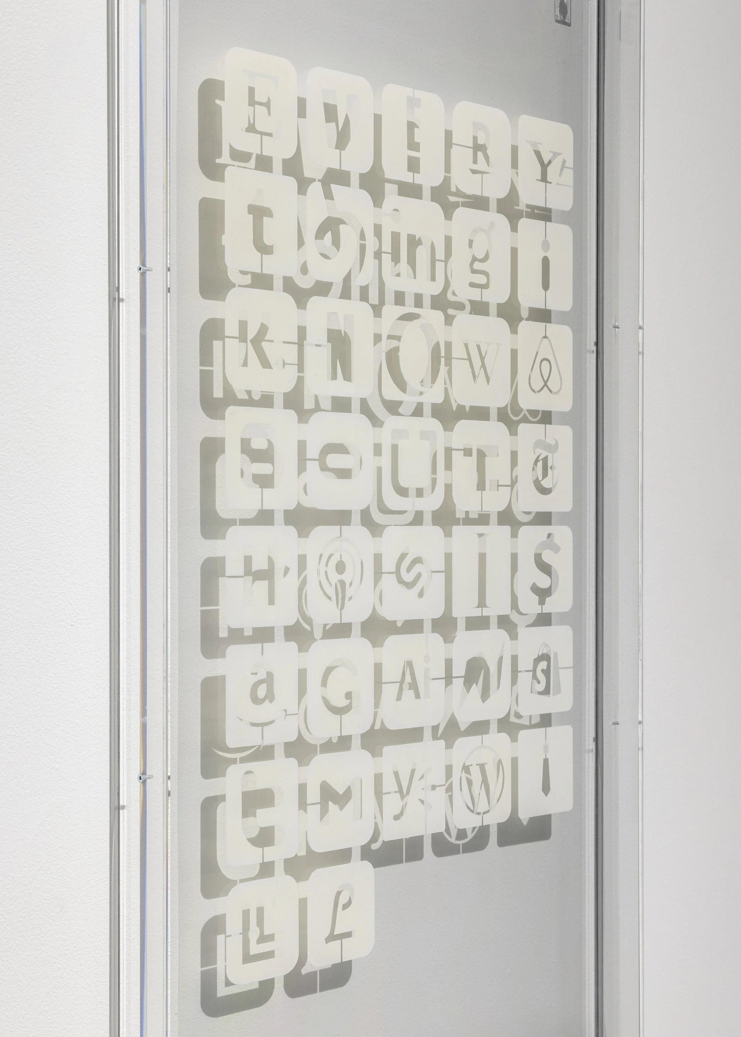 Ransom Notes (Everything I know about this is against my will), 2026 I  Acrylic spraypaint on clear polyester film, Acrylic frame. 106,5 x 55,5 x 5 cm I Photo: Malle Madsen