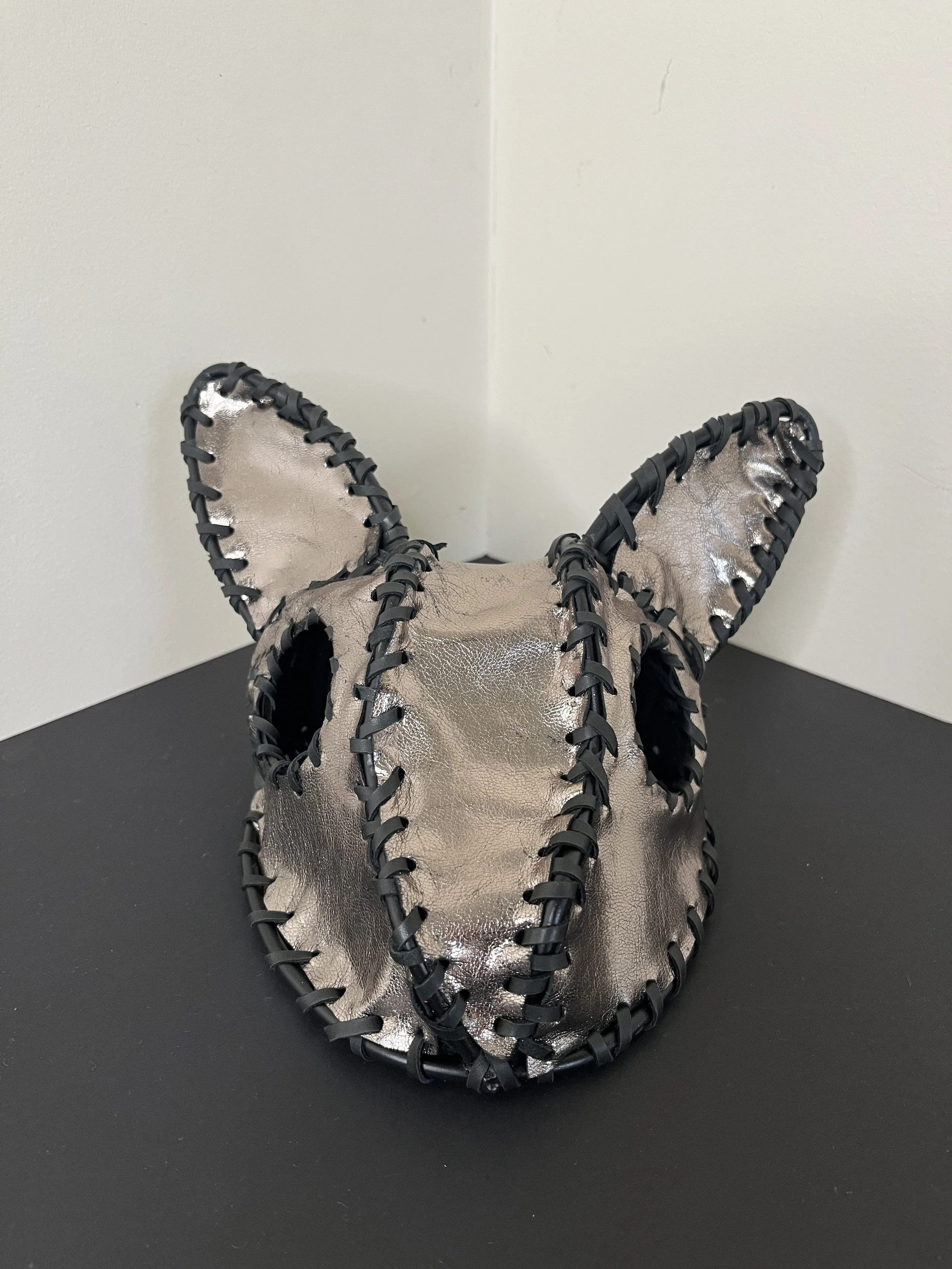 “Pyrite” (2026), welded steel, paint, leather, 20(w) x 11(h) x17(d) cm