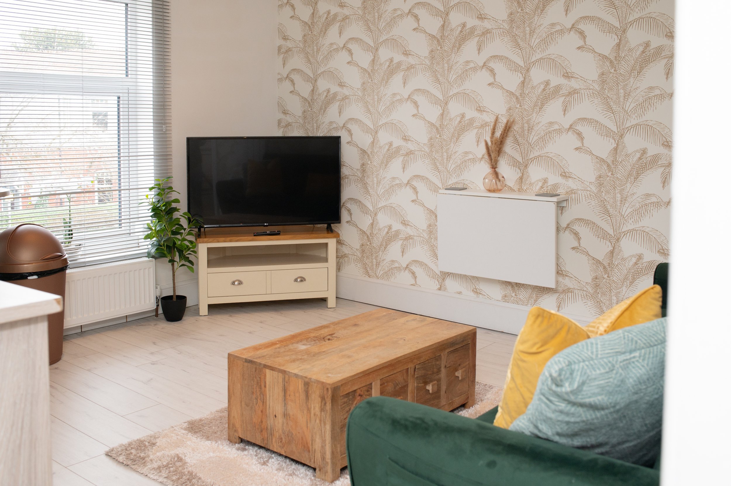 Alsager apartment lounge with smart TV and sofa bed