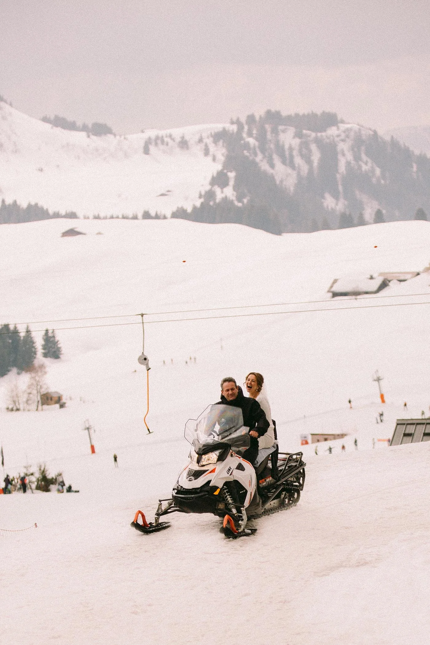 bride-groom-snowmobile-french-alps-wedding.jpg