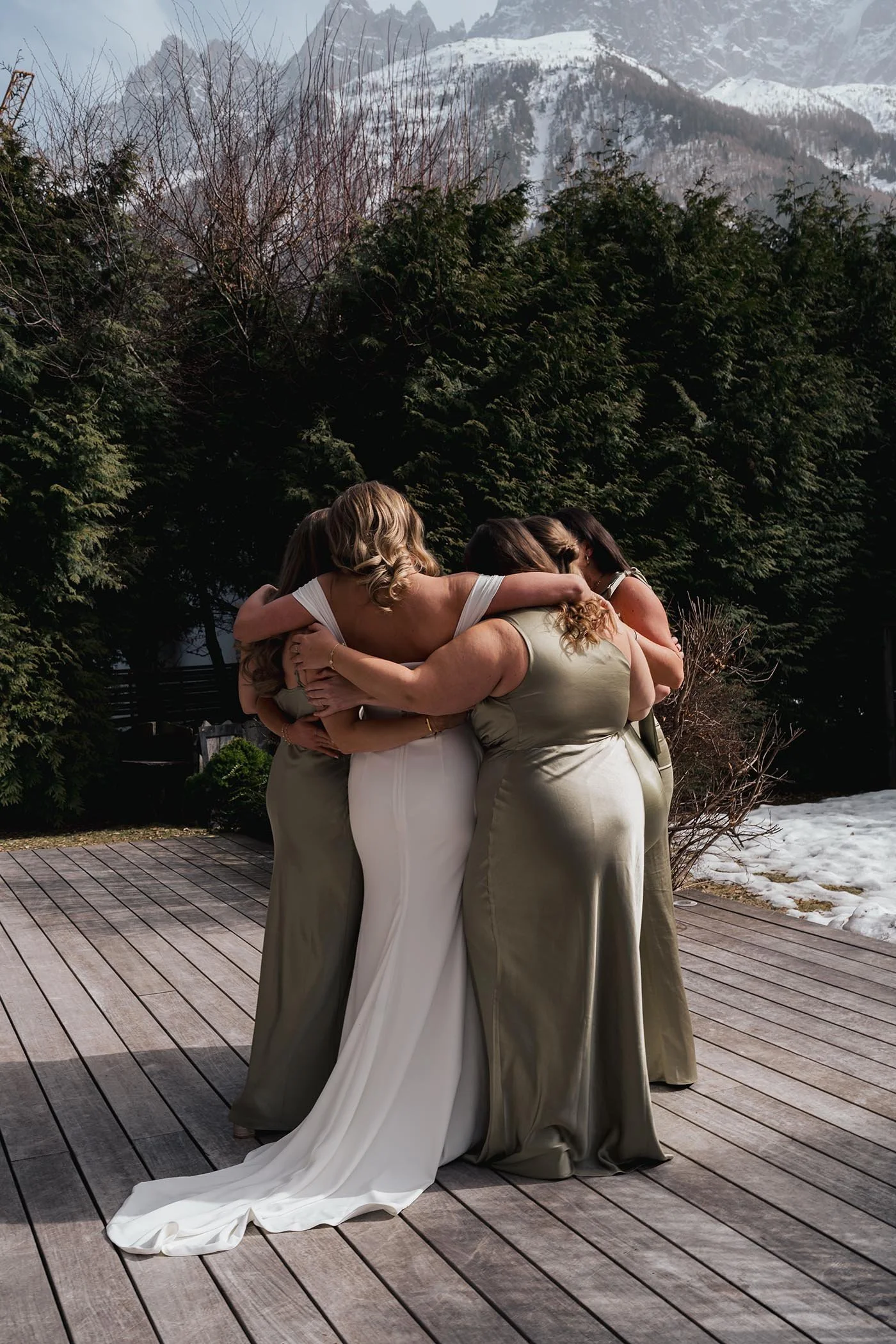 bride-intimate-embrace-bridesmaids-chamonix.jpg