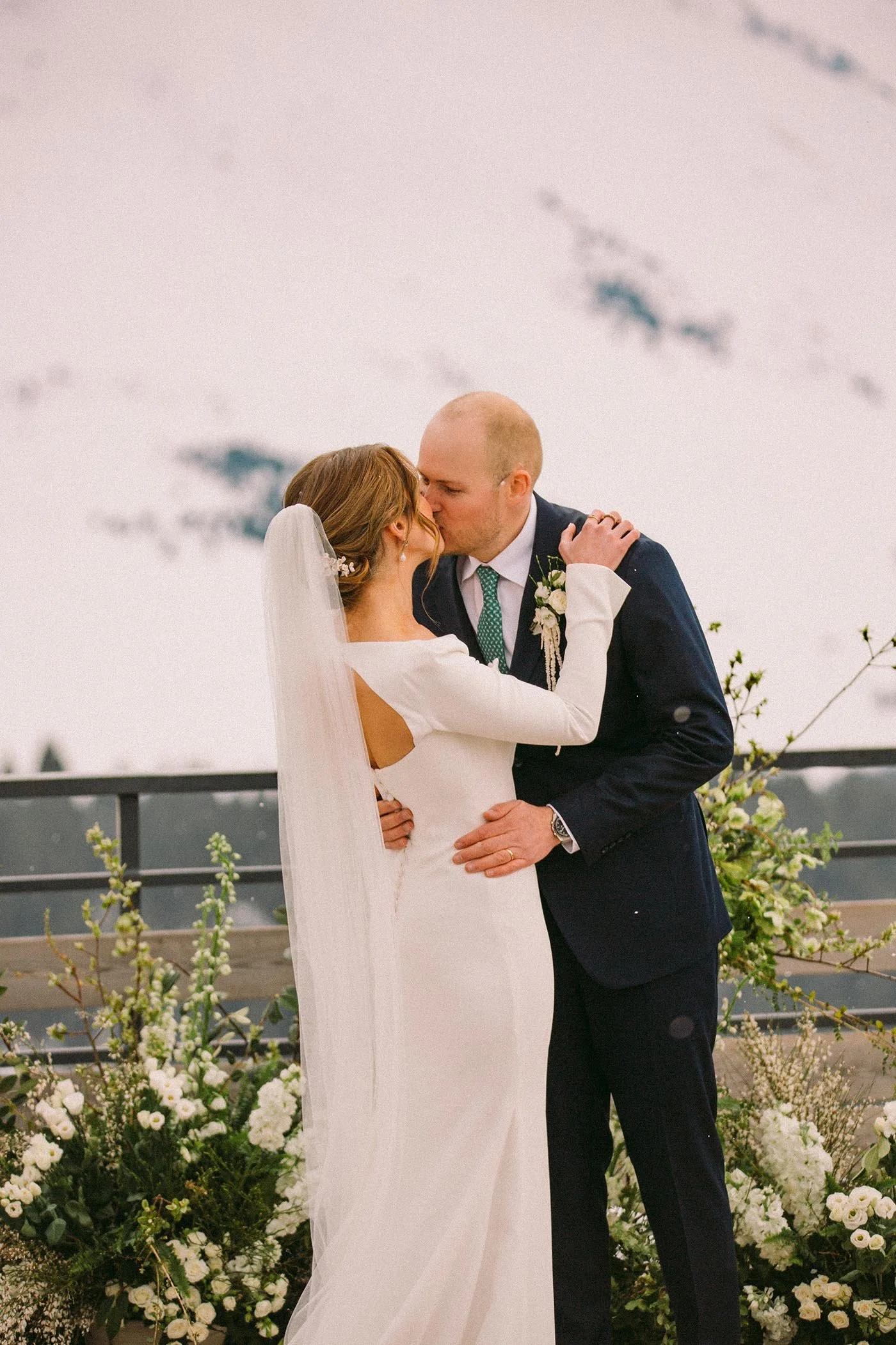wedding-ceremony-kiss-french-alps-mountain-view.jpg