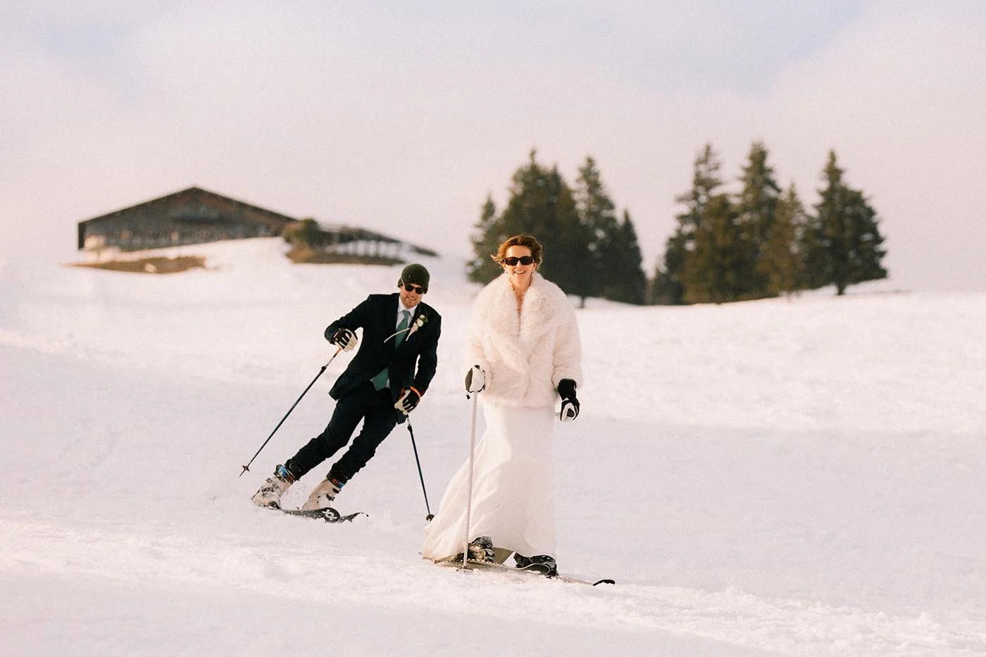 la-clusaz-winter-wedding-bride-groom-skiing-together.jpg
