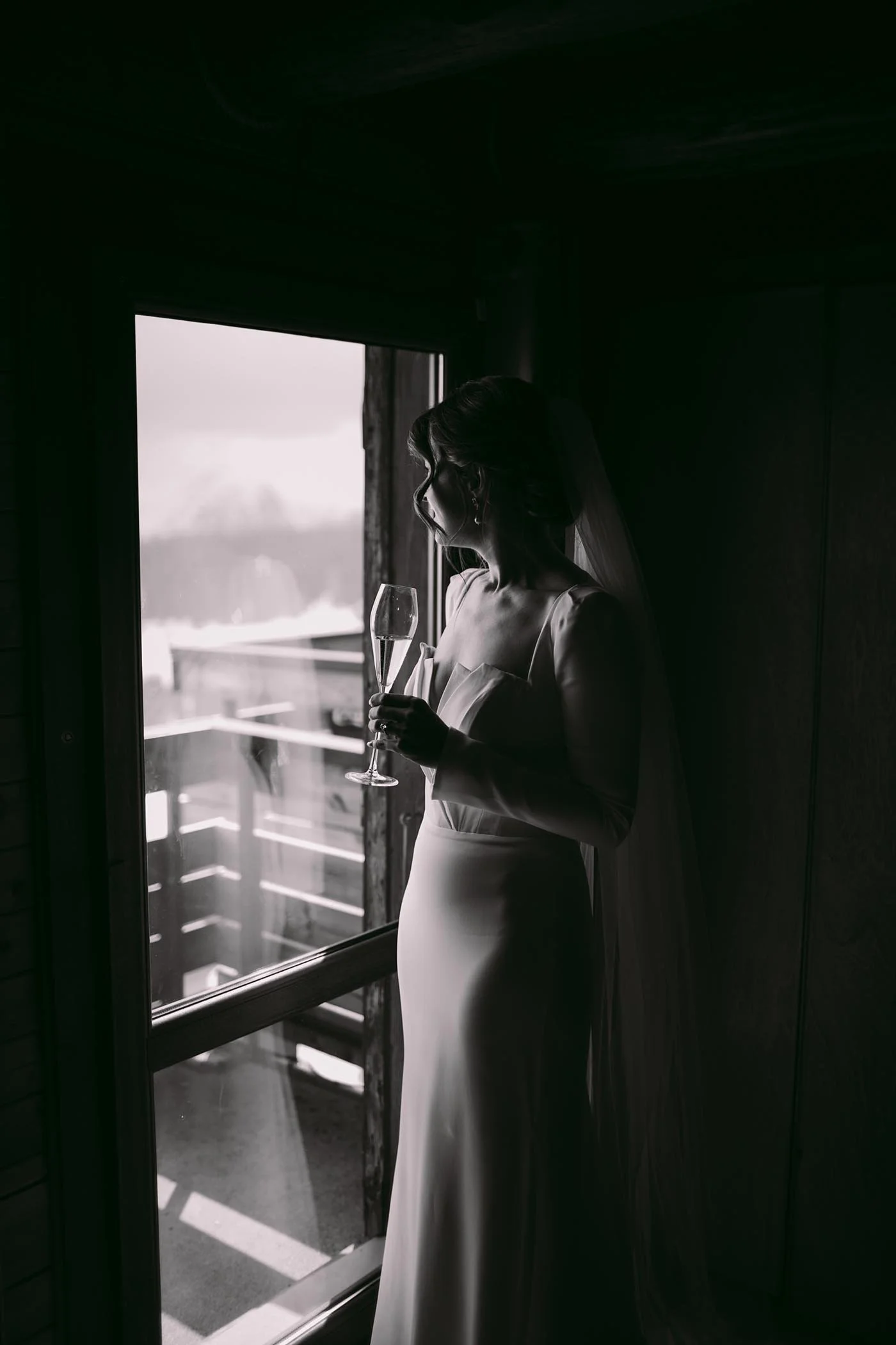 la-clusaz-winter-wedding-bride-window-portrait.jpg