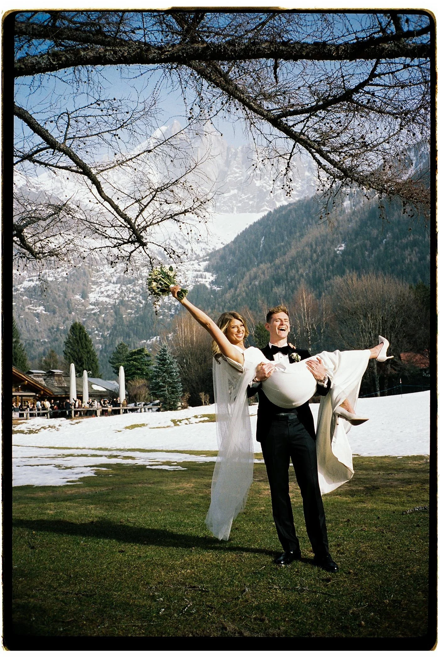 tori-harry-chamonix-wedding-groom-carrying-bride-portrait.jpg