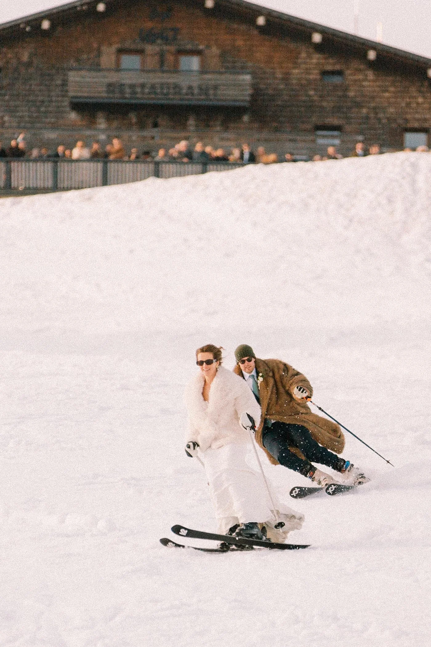 la-clusaz-ski-wedding-bride-groom-skiing.jpg