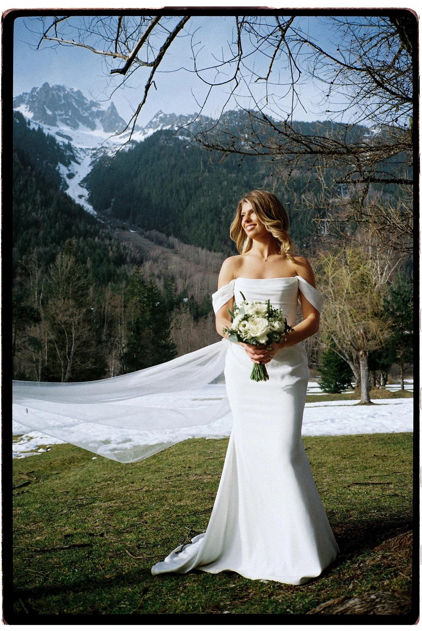 tori-harry-chamonix-wedding-bride-portrait-veil-mountains.jpg