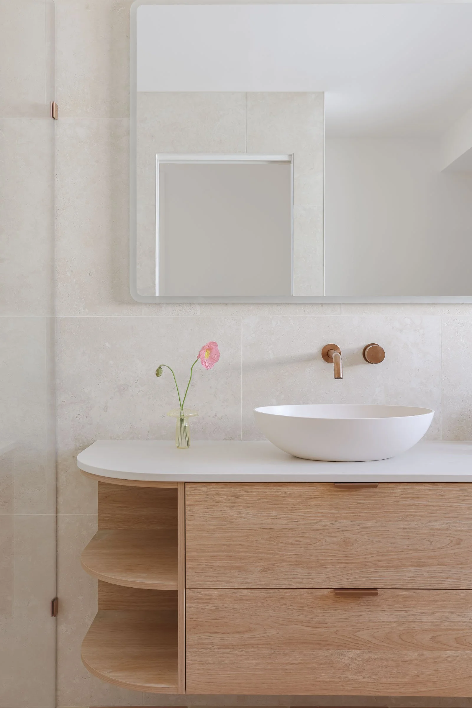 coastal neutral modern bathroom wood curved vanity copper tapware