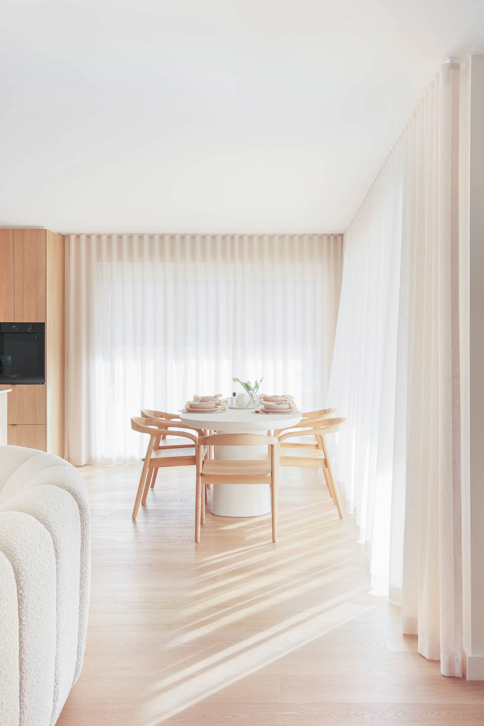 neutral coastal modern wood dining space
