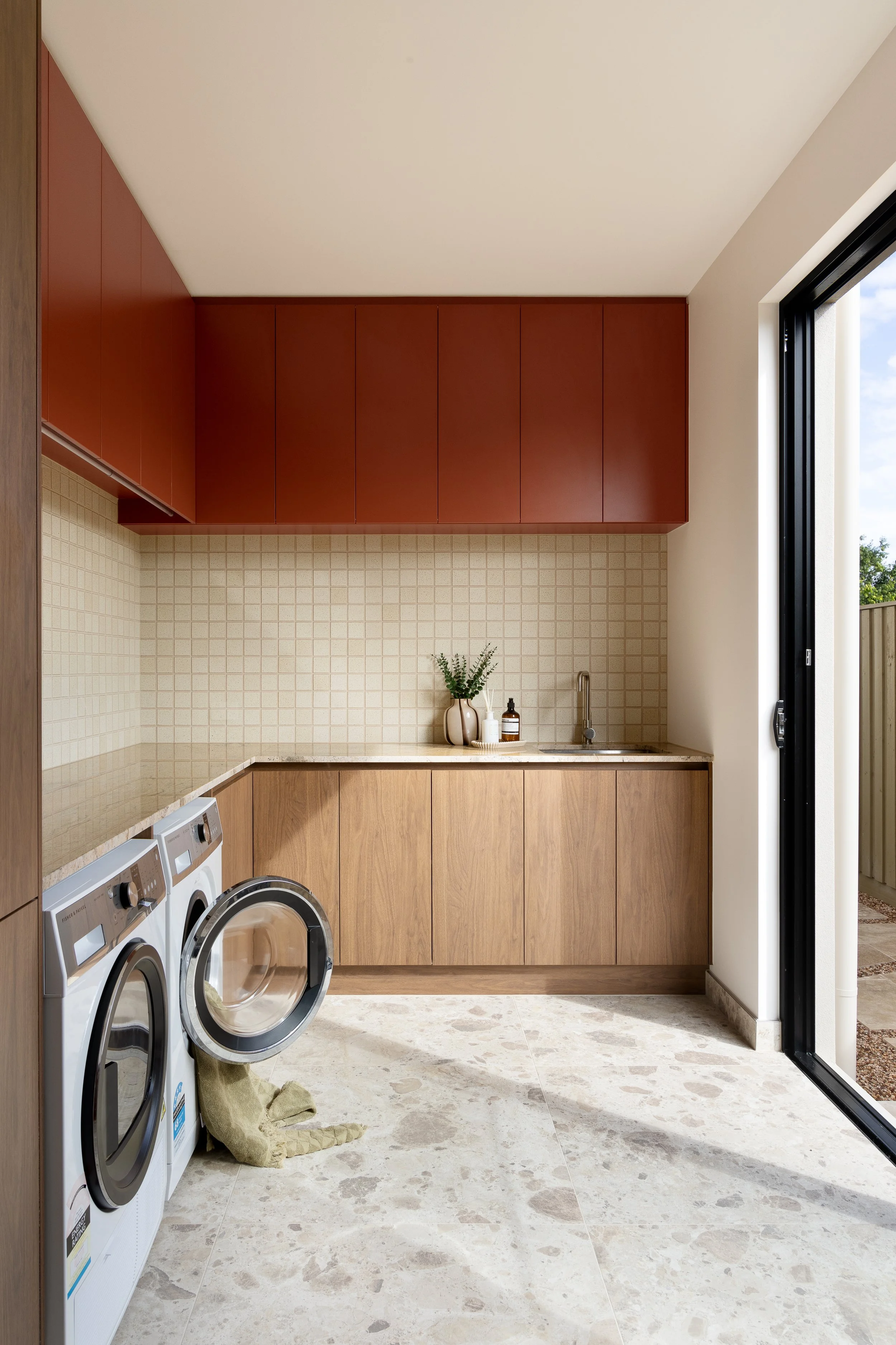 bold red cabinetry neutral colour pop laundry