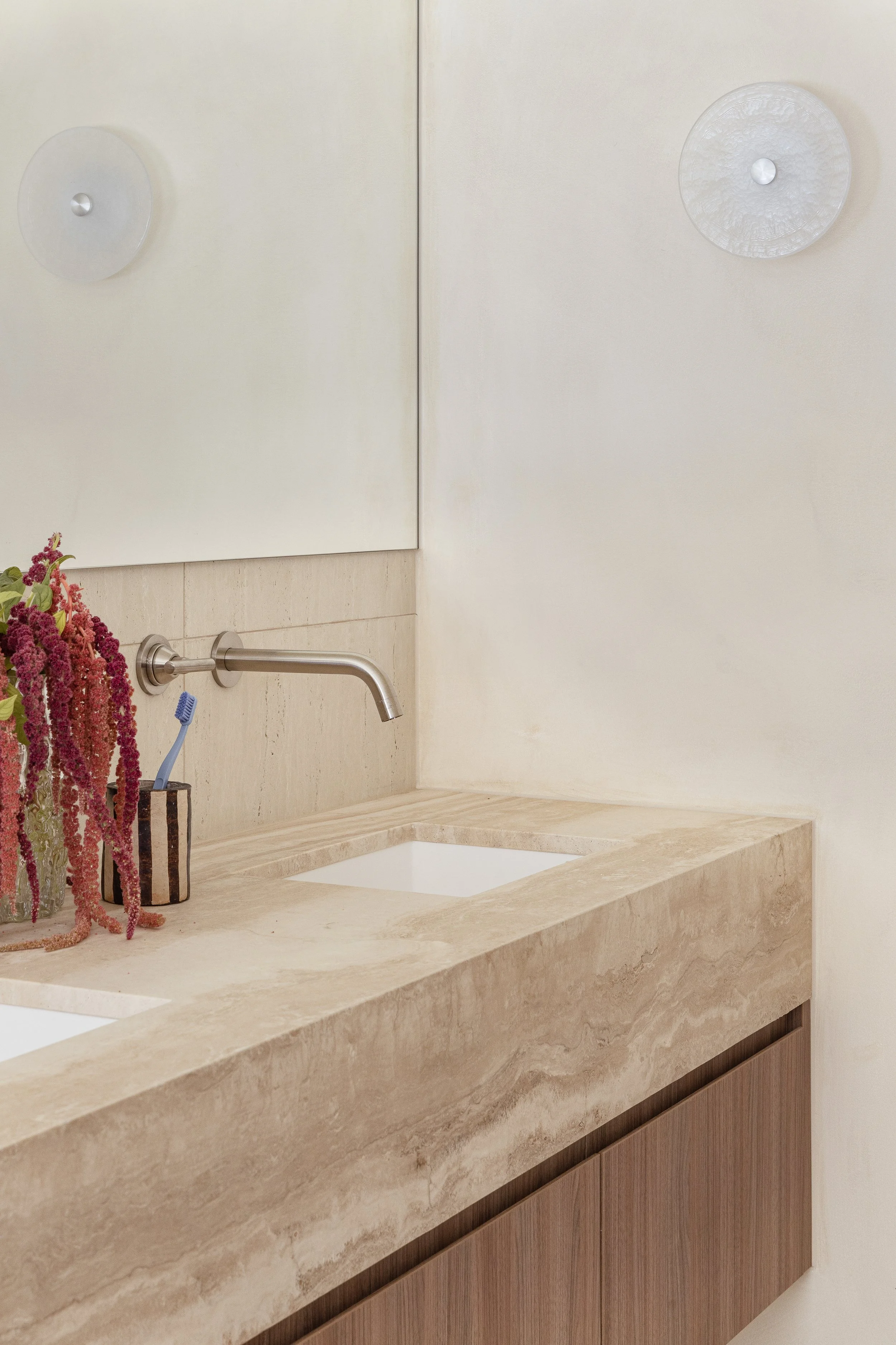 the valle casa neutral travertine bathroom