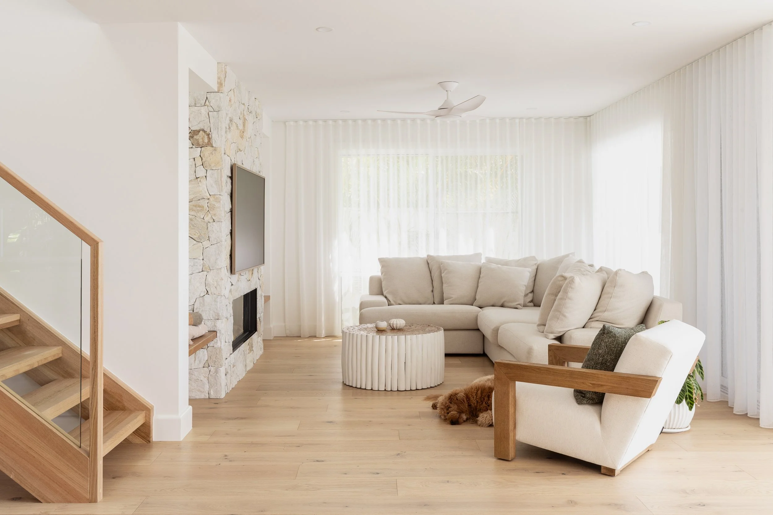 neutral-coastal-aesthetic-home-stone-cladding-fireplace